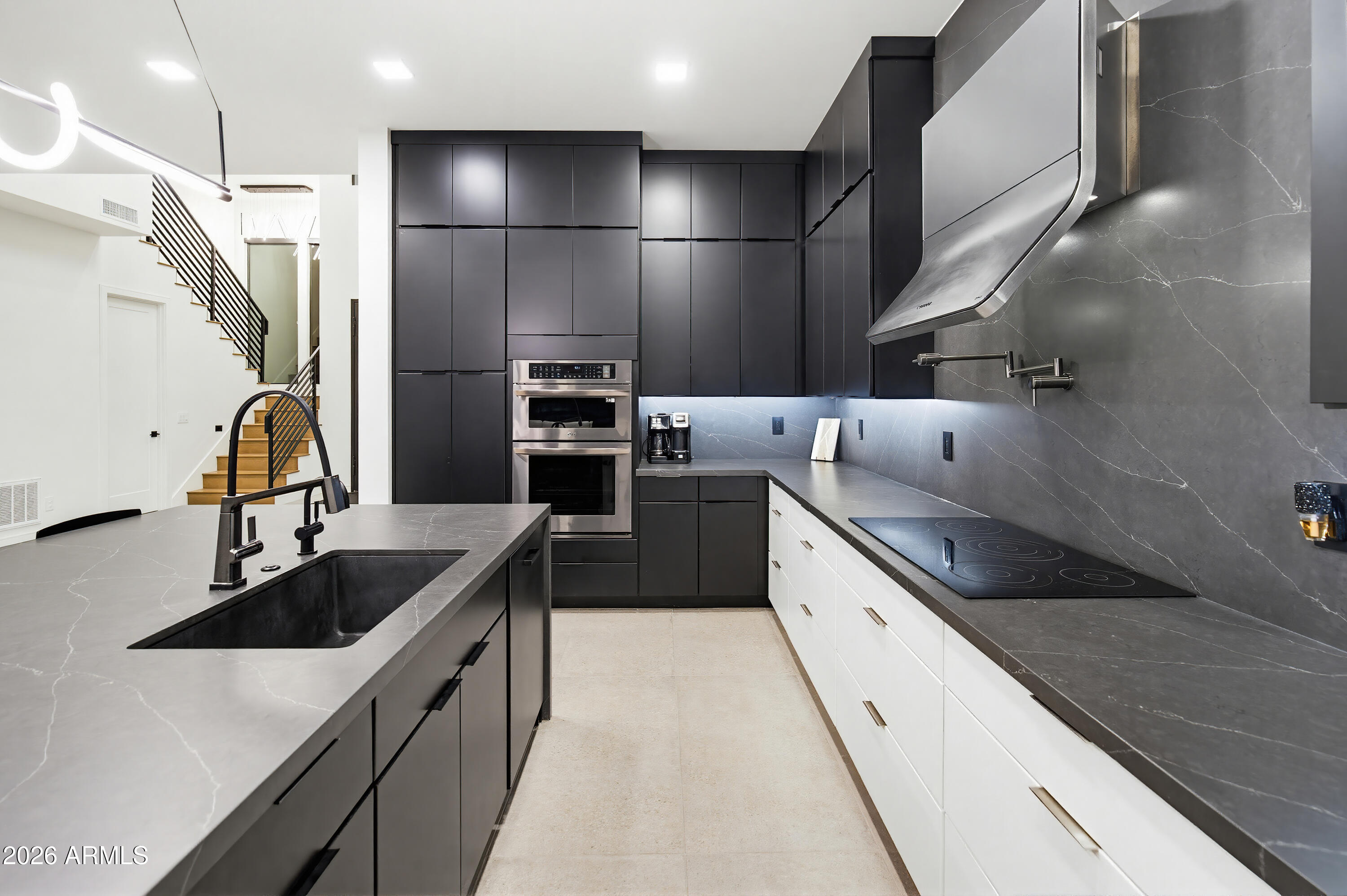3350 East Highline Canal Road Phoenix, AZ 85042 - Photo 13 of 105 a kitchen with stainless steel appliances granite countertop a sink and a refrigerator