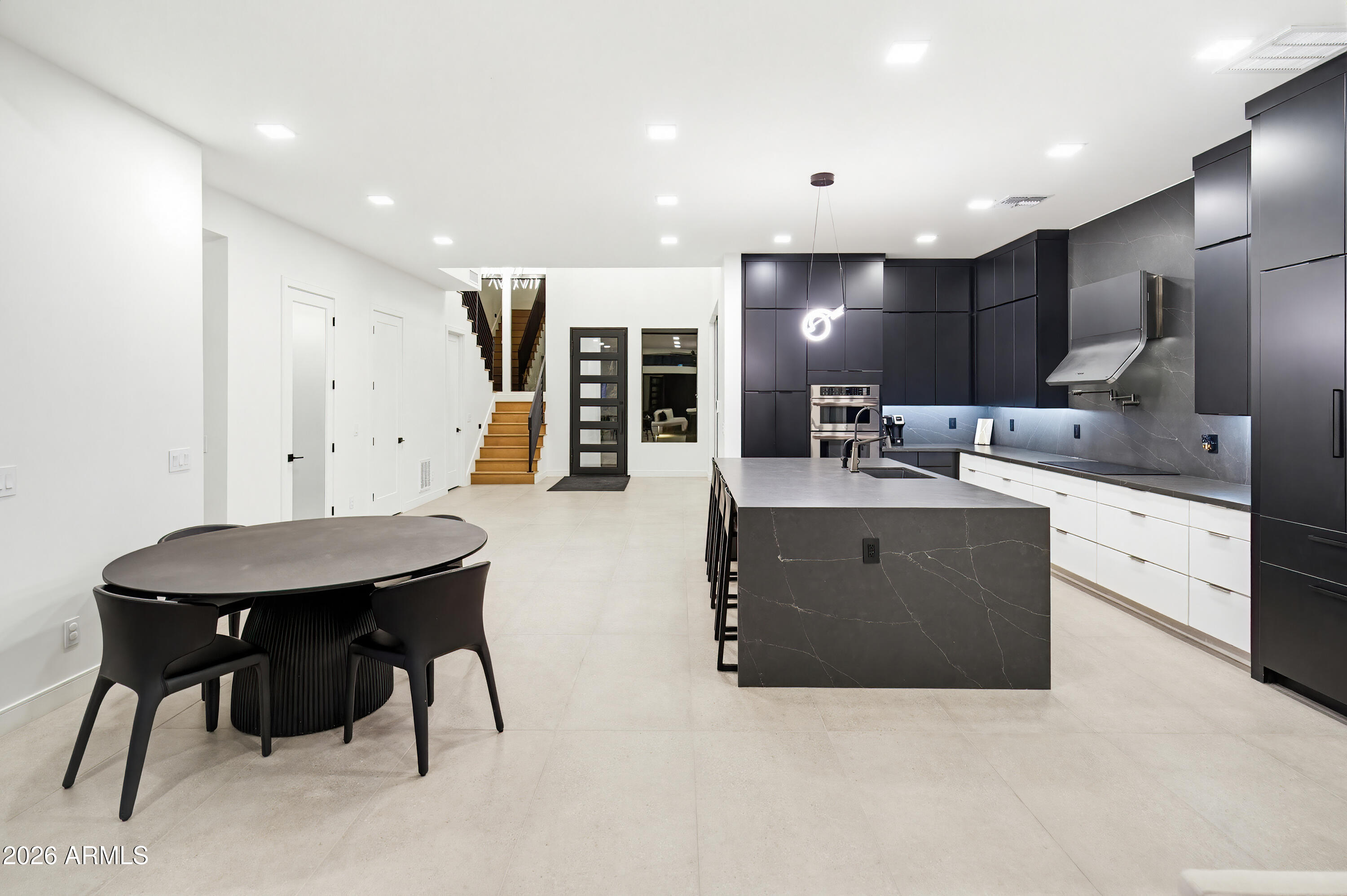 3350 East Highline Canal Road Phoenix, AZ 85042 - Photo 15 of 105 a large kitchen with a table and chairs