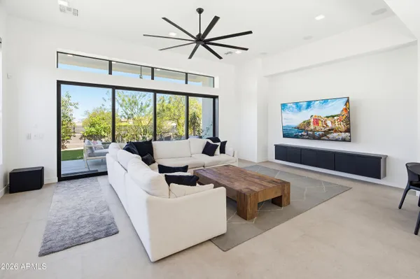 a bathroom with a bathtub and a window