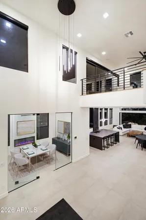 a bedroom with bed and window