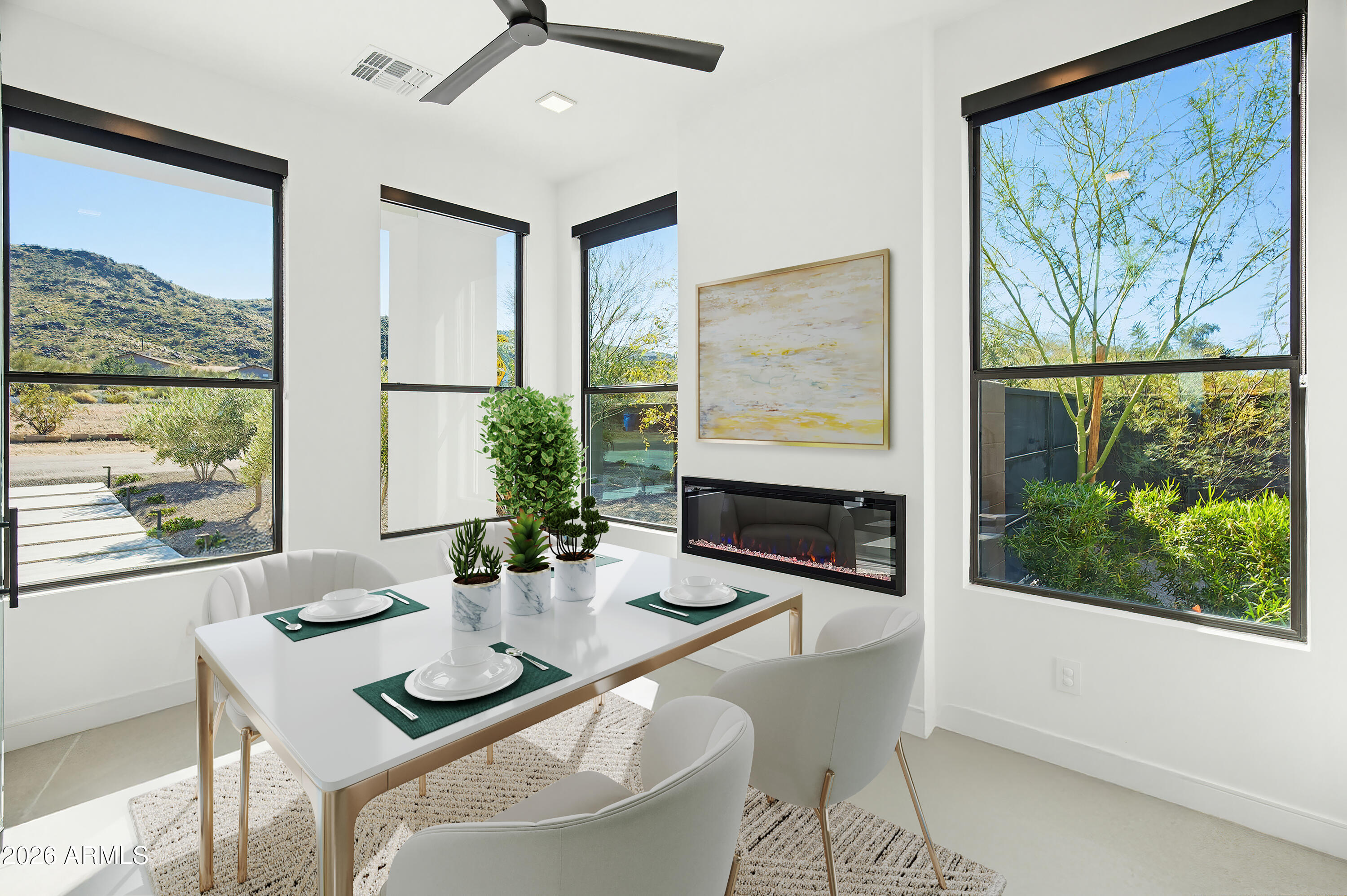 3350 East Highline Canal Road Phoenix, AZ 85042 - Photo 35 of 105 a living room with fireplace furniture and a large window