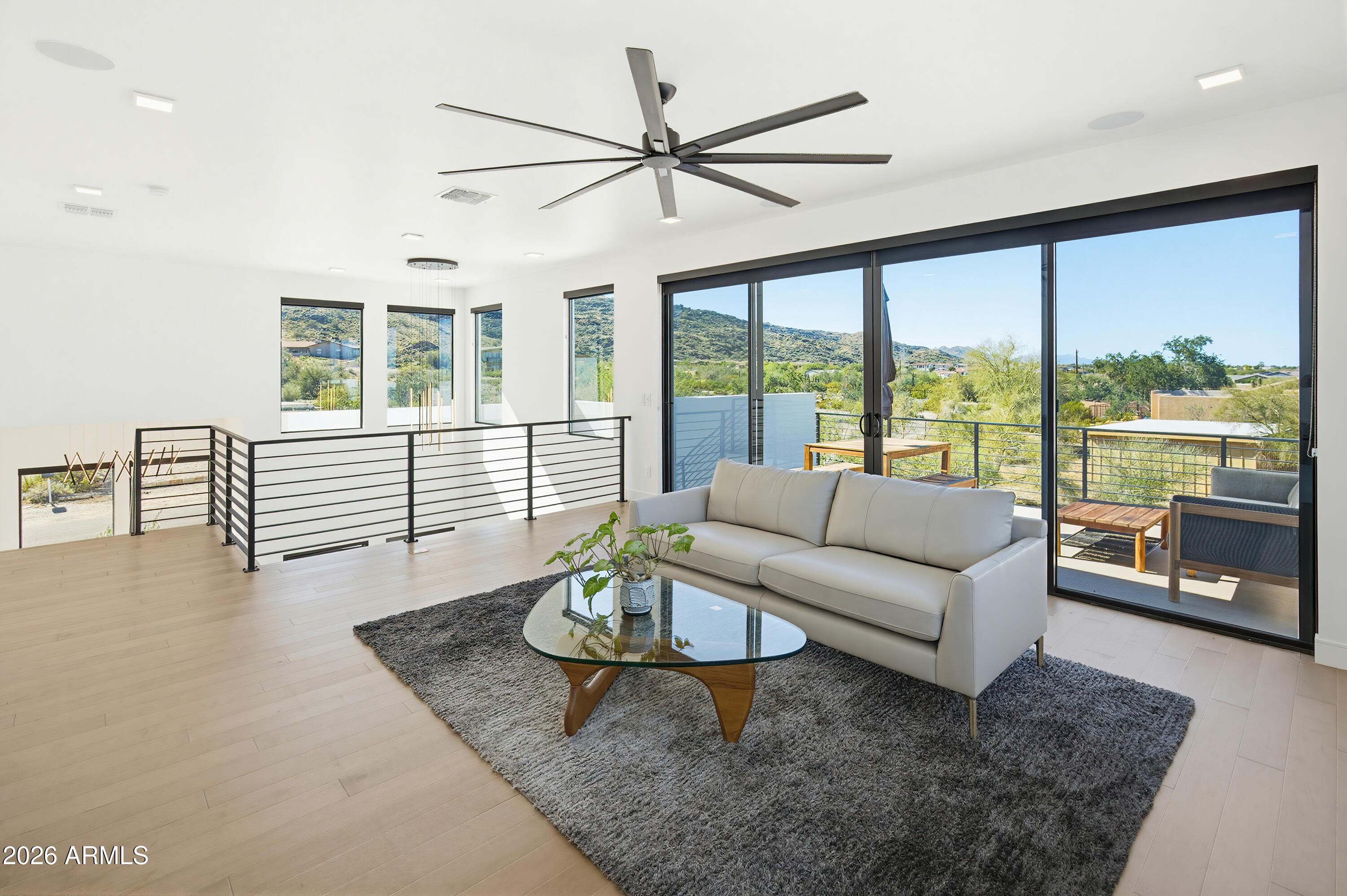 3350 East Highline Canal Road Phoenix, AZ 85042 - Photo 37 of 105 a living room with furniture and a large window