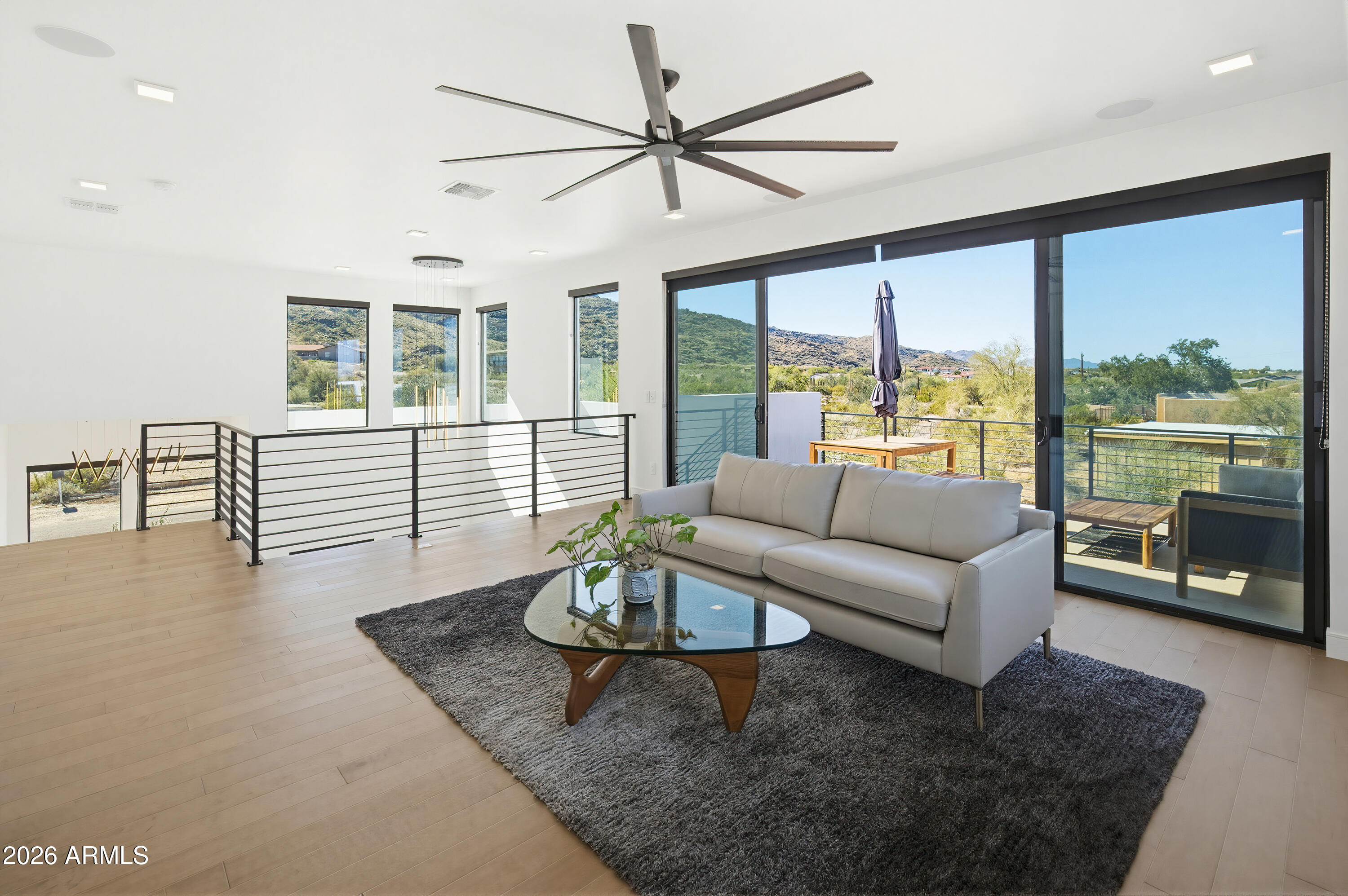 3350 East Highline Canal Road Phoenix, AZ 85042 - Photo 38 of 105 a living room with furniture and a large window