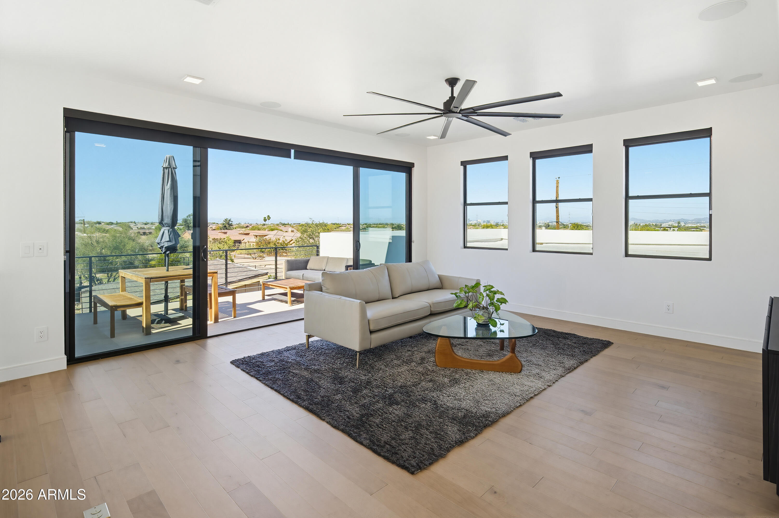 3350 East Highline Canal Road Phoenix, AZ 85042 - Photo 41 of 105 a living room with couch and a table
