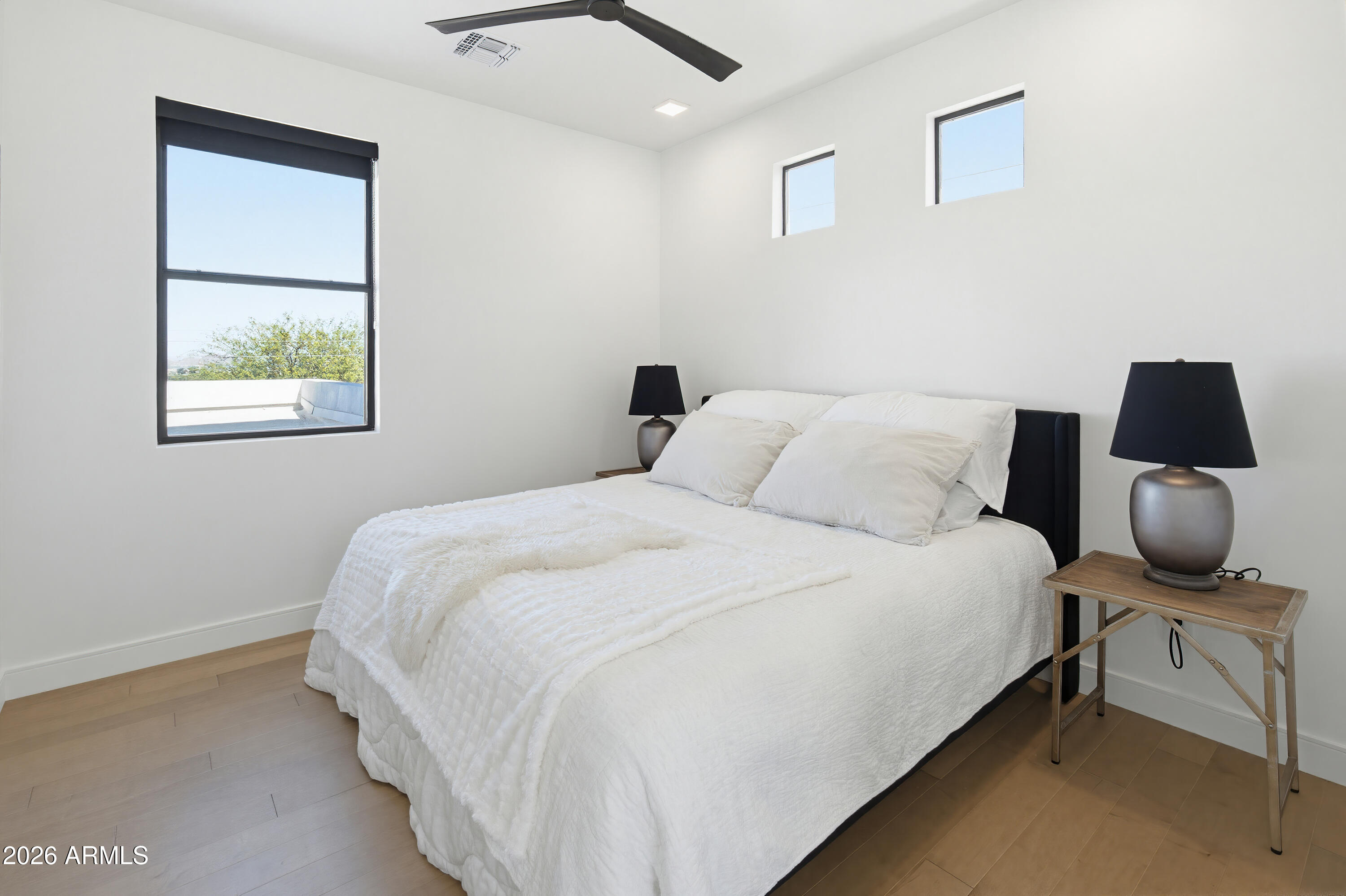 3350 East Highline Canal Road Phoenix, AZ 85042 - Photo 51 of 105 a bedroom with bed and window