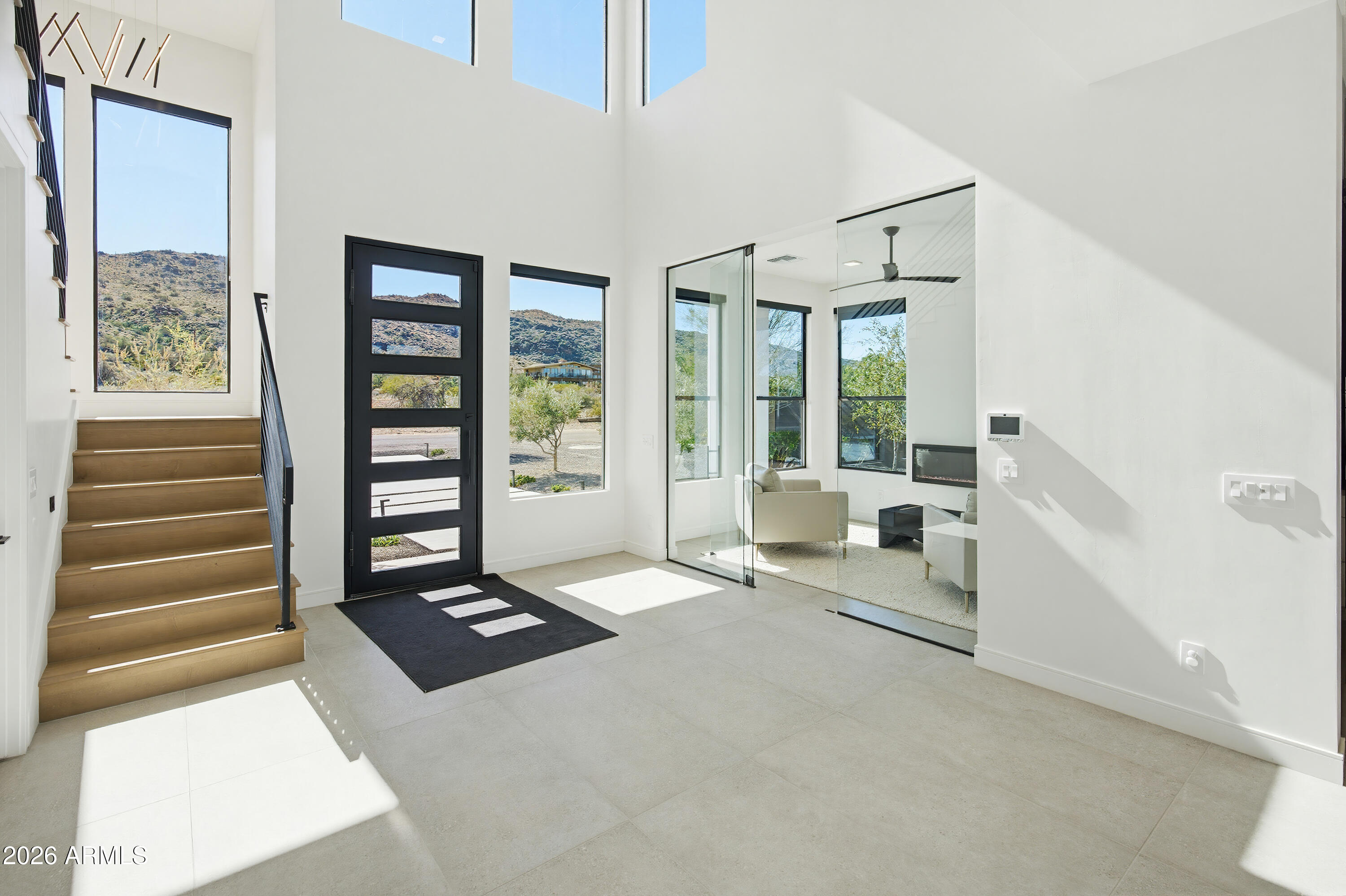 3350 East Highline Canal Road Phoenix, AZ 85042 - Photo 56 of 105 a living room with furniture and large windows