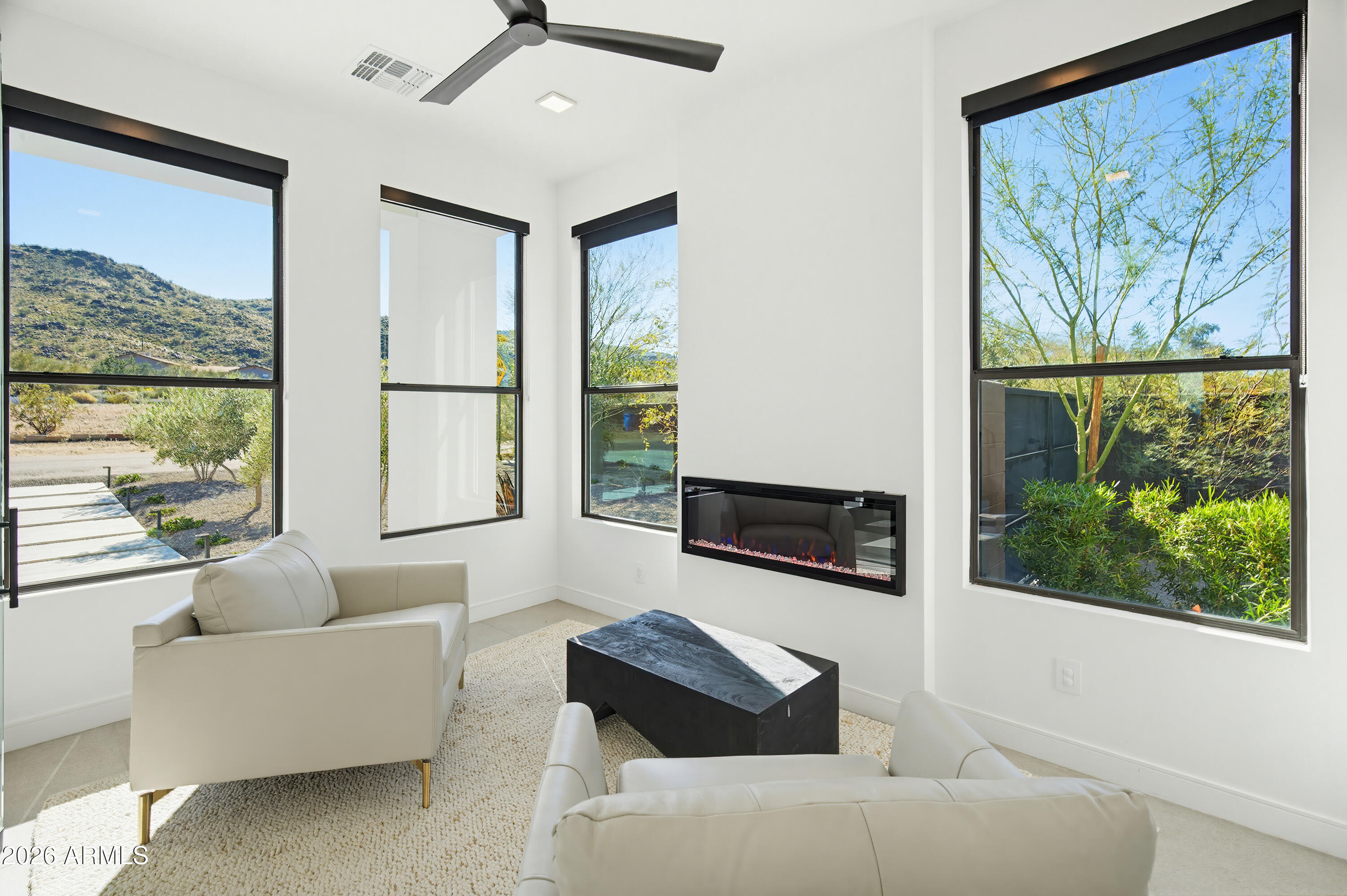 3350 East Highline Canal Road Phoenix, AZ 85042 - Photo 59 of 105 a living room with furniture and a large window
