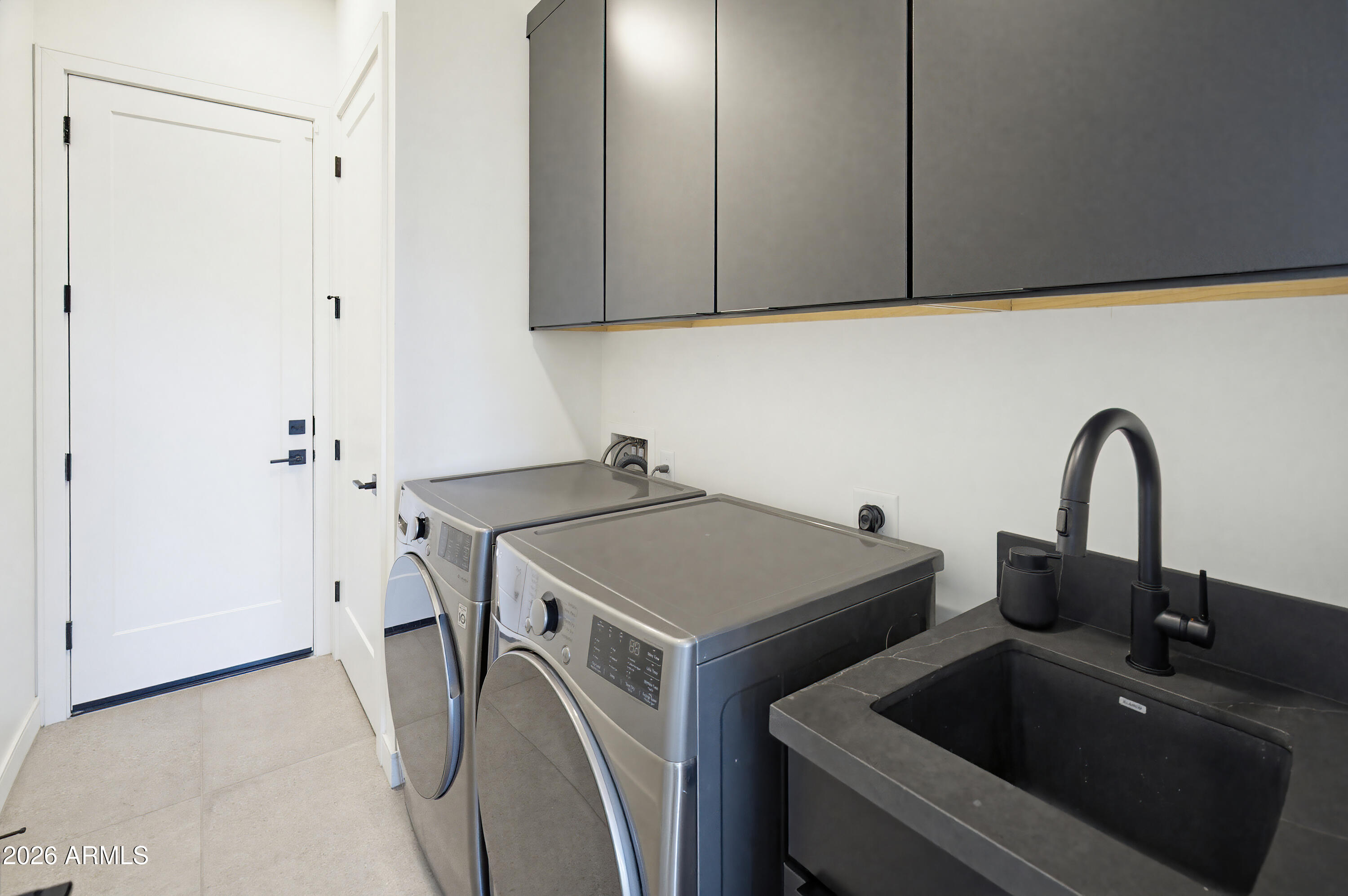 3350 East Highline Canal Road Phoenix, AZ 85042 - Photo 61 of 105 a utility room with dryer and washer