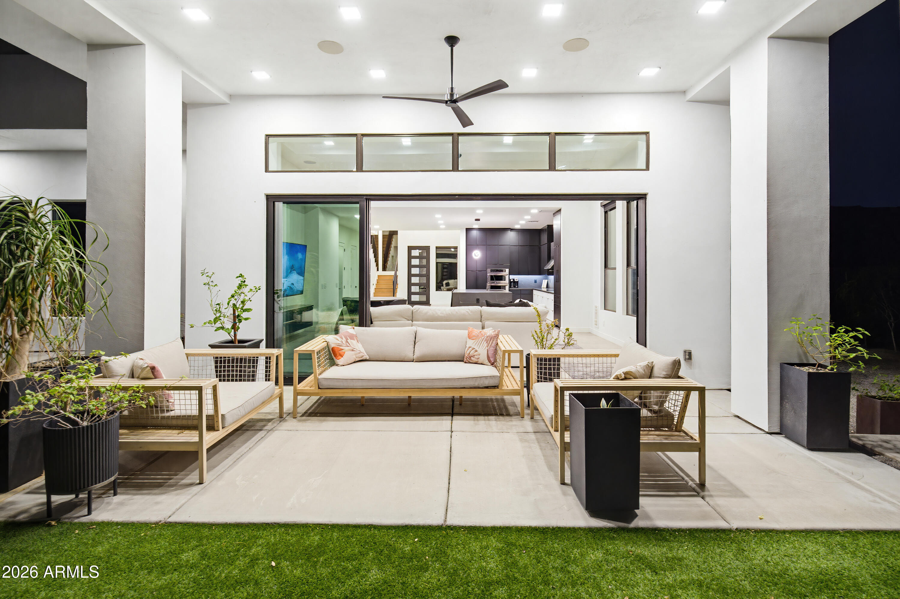 3350 East Highline Canal Road Phoenix, AZ 85042 - Photo 70 of 105 a living room with furniture a rug and a fireplace