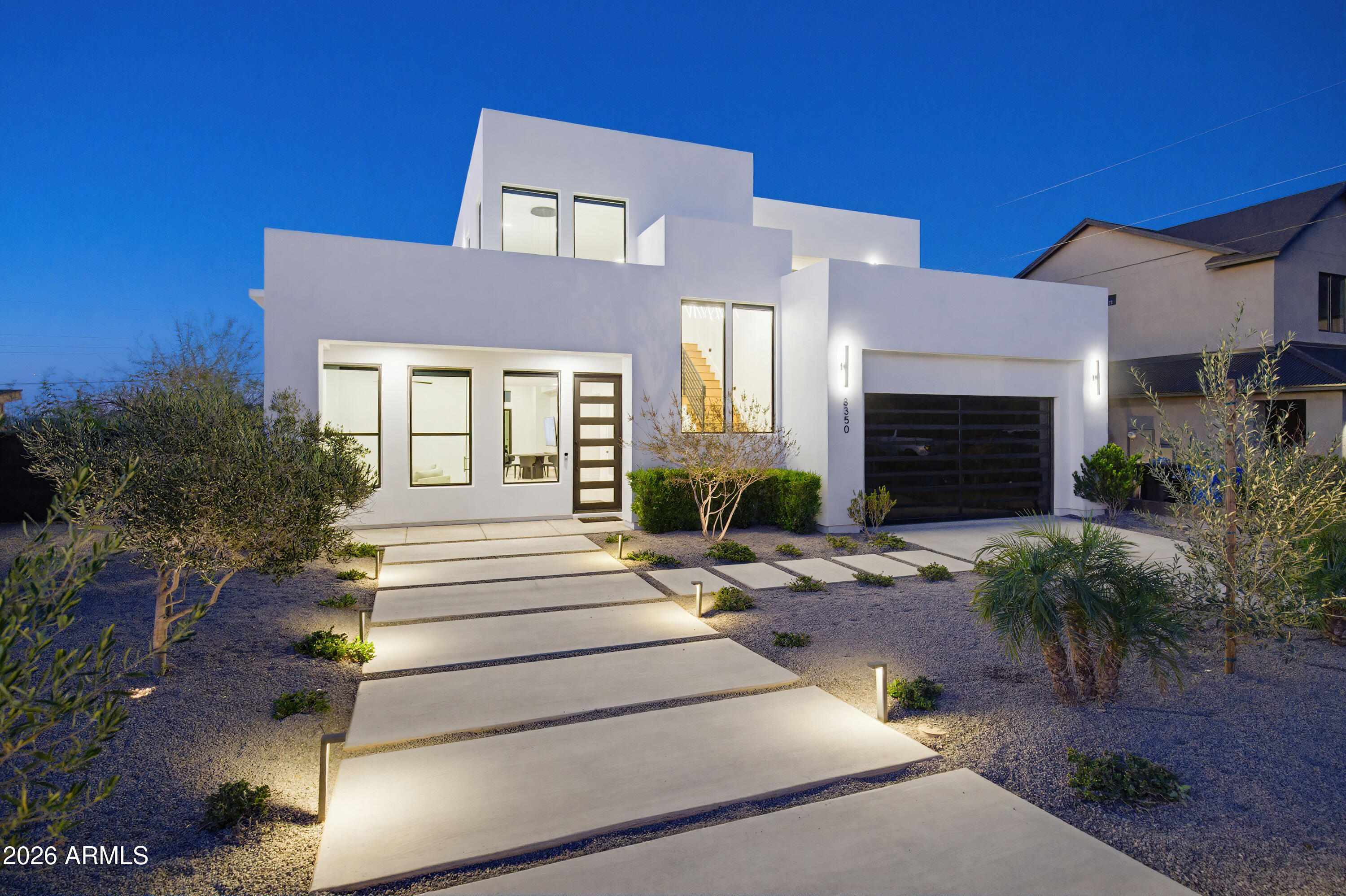3350 East Highline Canal Road Phoenix, AZ 85042 - Photo 86 of 105 a front view of a house with garden