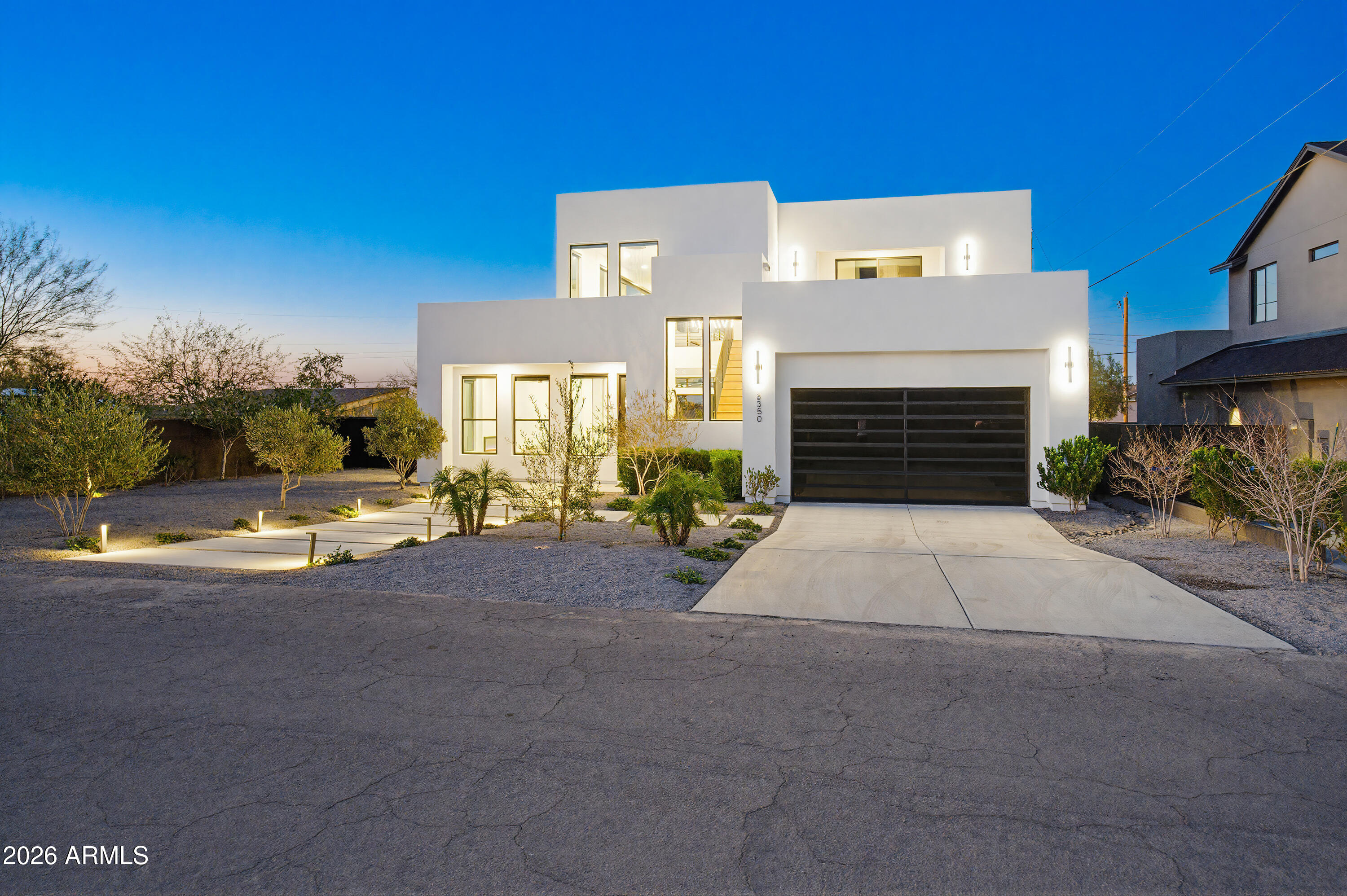 3350 East Highline Canal Road Phoenix, AZ 85042 - Photo 87 of 105 a view of a house with a street and a fire pit