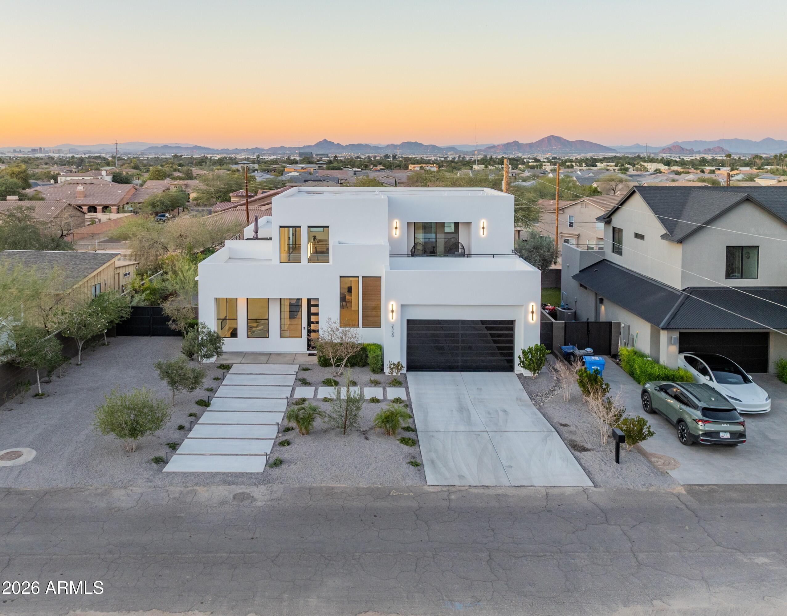3350 East Highline Canal Road Phoenix, AZ 85042 - Photo 93 of 105 a view of house with outdoor space and parking