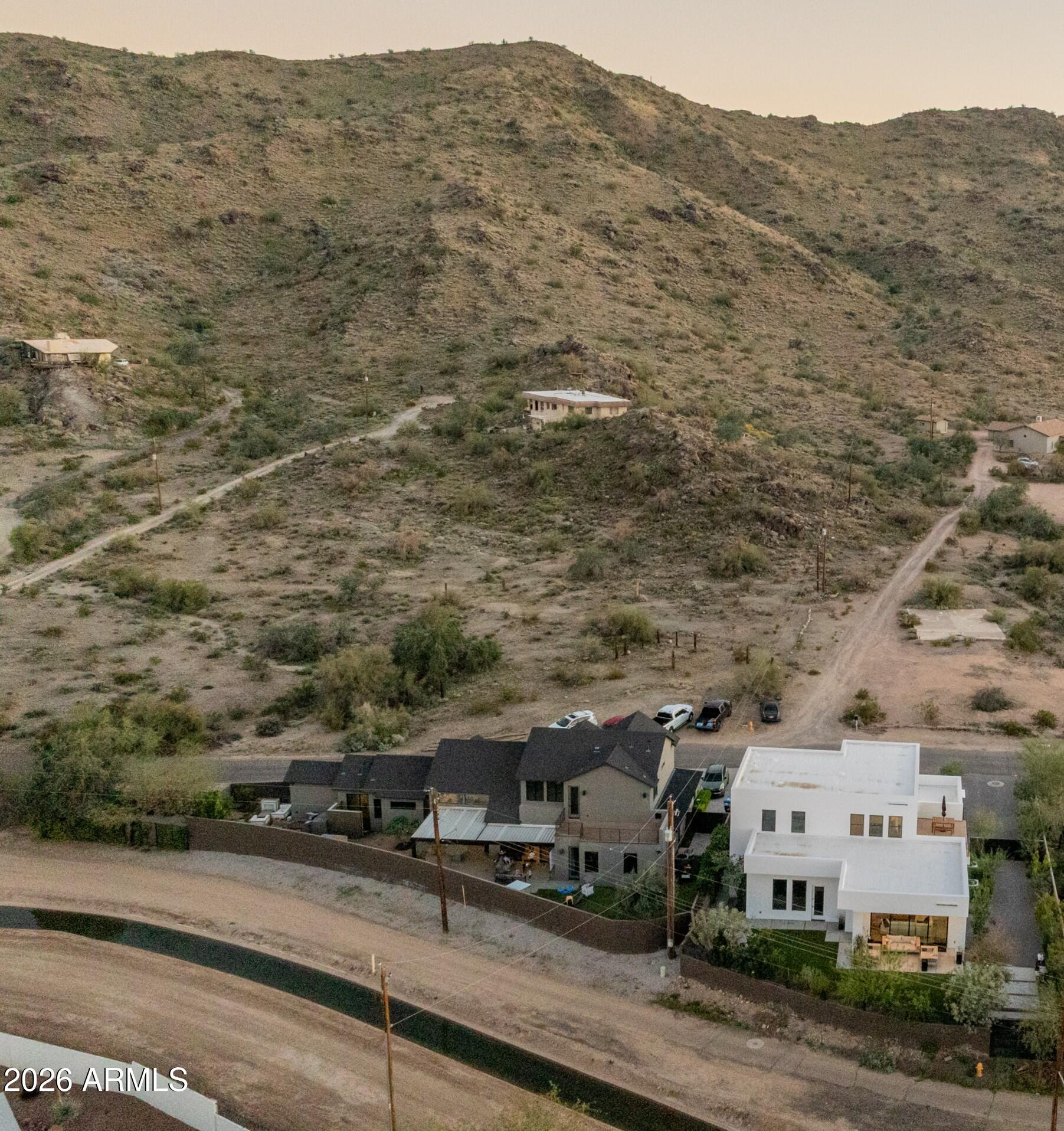 3350 East Highline Canal Road Phoenix, AZ 85042 - Photo 94 of 105 an aerial view of residential houses with outdoor space