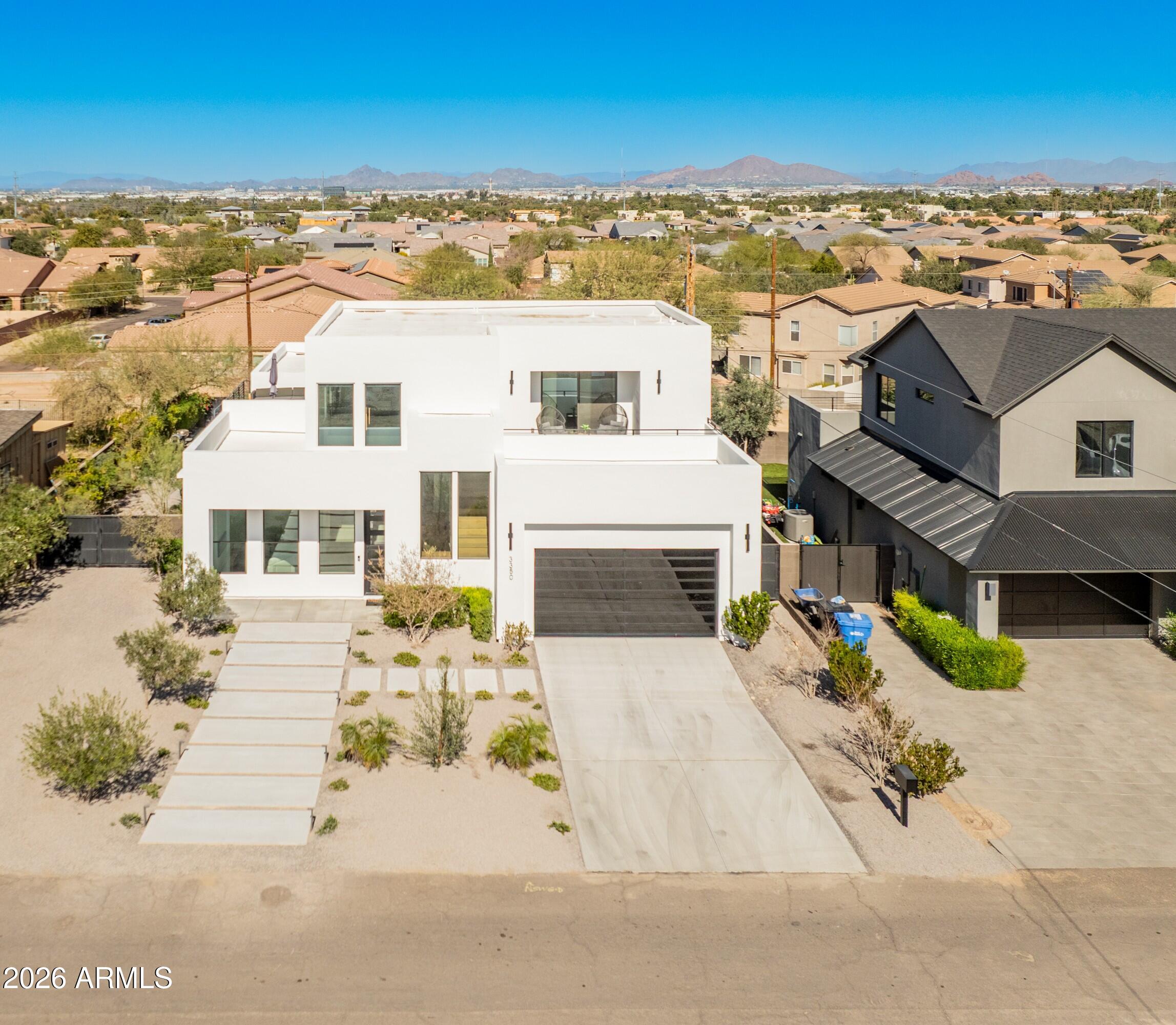 3350 East Highline Canal Road Phoenix, AZ 85042 - Photo 99 of 105 an aerial view of residential houses with outdoor space