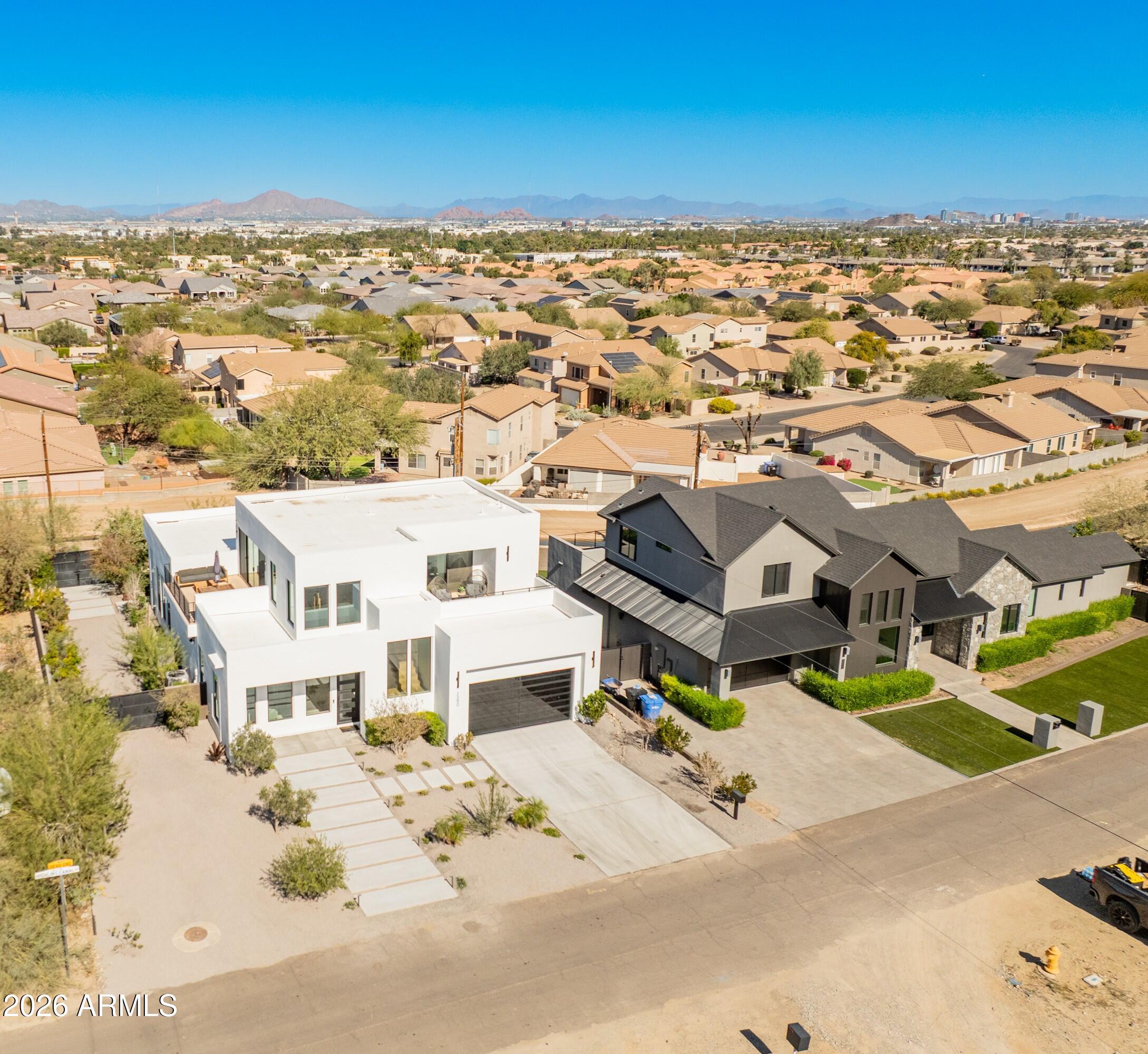 3350 East Highline Canal Road Phoenix, AZ 85042 - Photo 100 of 105 an aerial view of residential houses with outdoor space