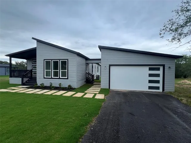 a house view with a outdoor space