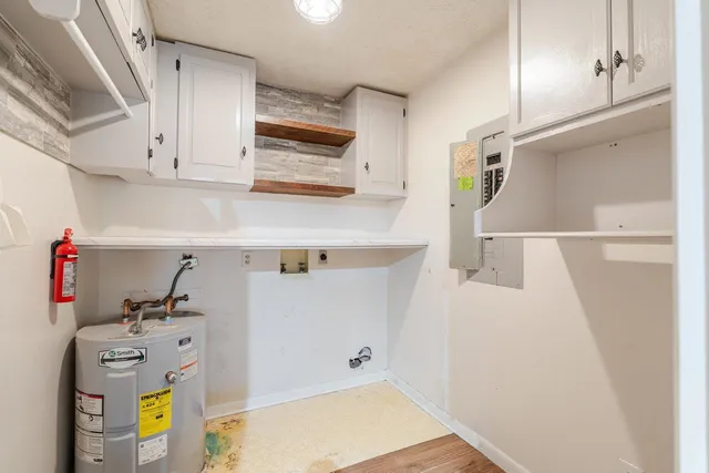 a view of storage and utility room with washer and dryer