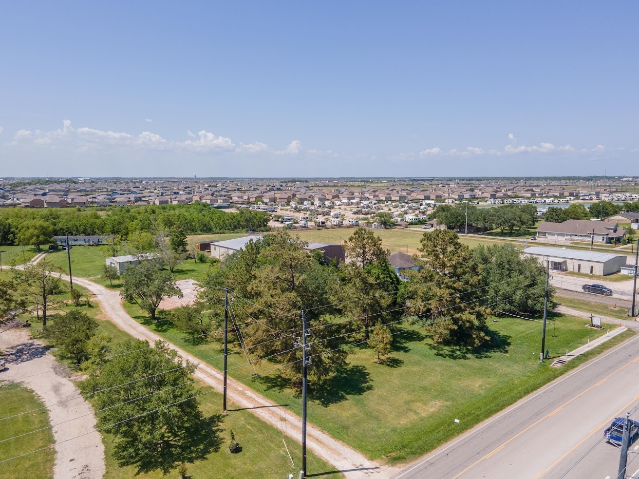 5707 South Farm-to-Market 565 Road Baytown, TX 77523 - Photo 13 of 18 a view of a lake with a mountain in the background