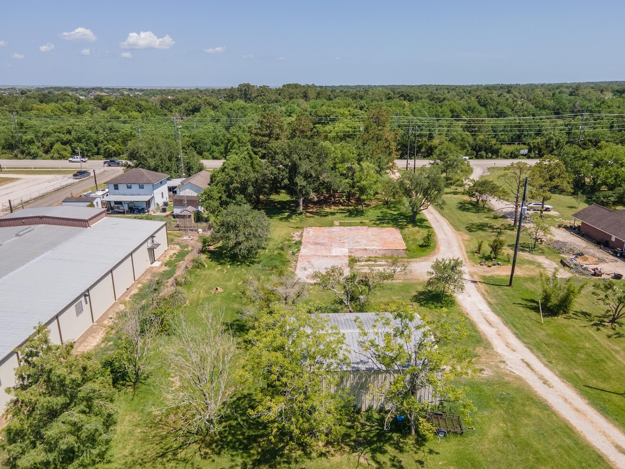 5707 South Farm-to-Market 565 Road Baytown, TX 77523 - Photo 16 of 18 a picture of houses with yard