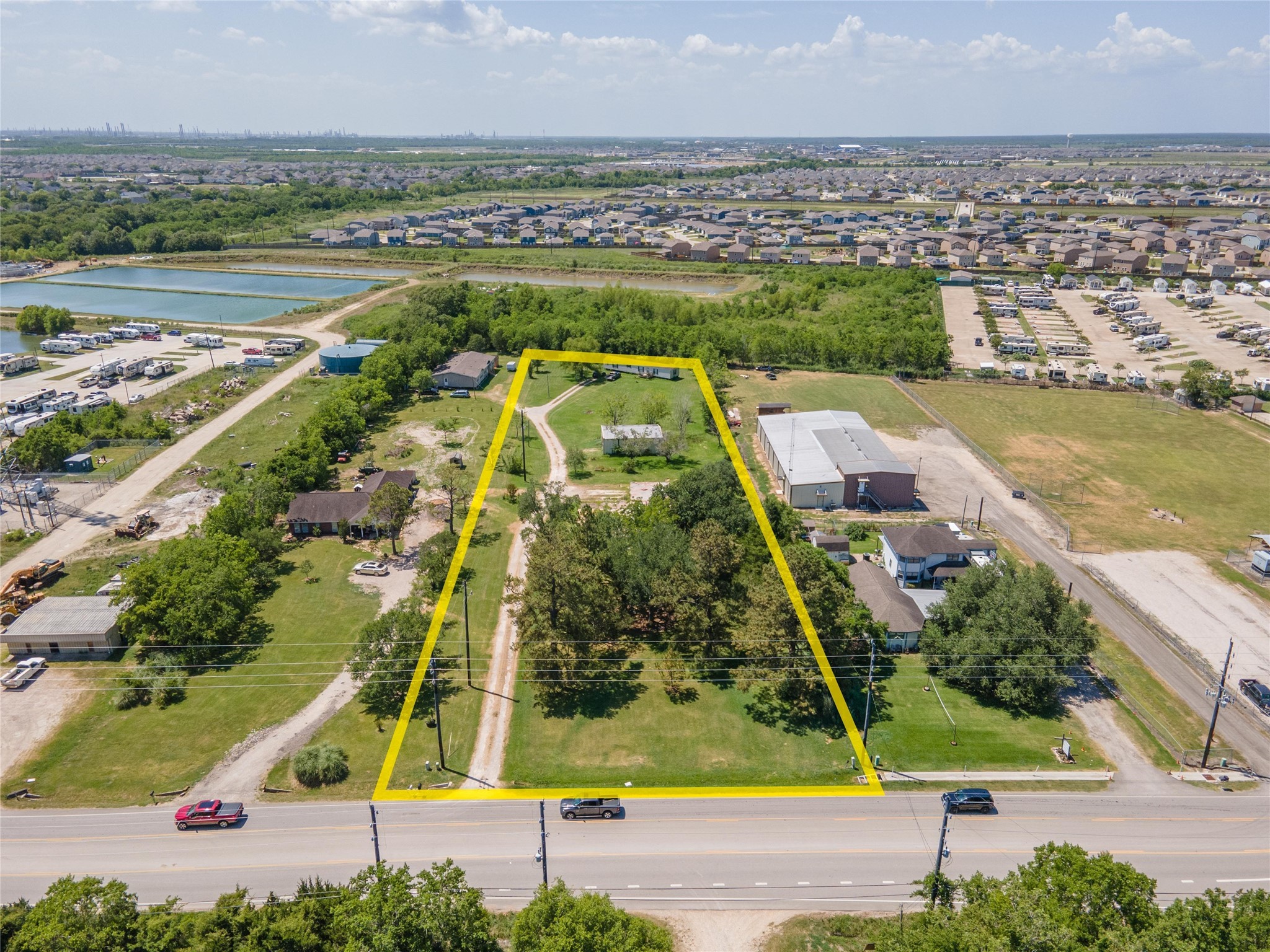 5707 South Farm-to-Market 565 Road Baytown, TX 77523 - Photo 2 of 18 an aerial view of a city