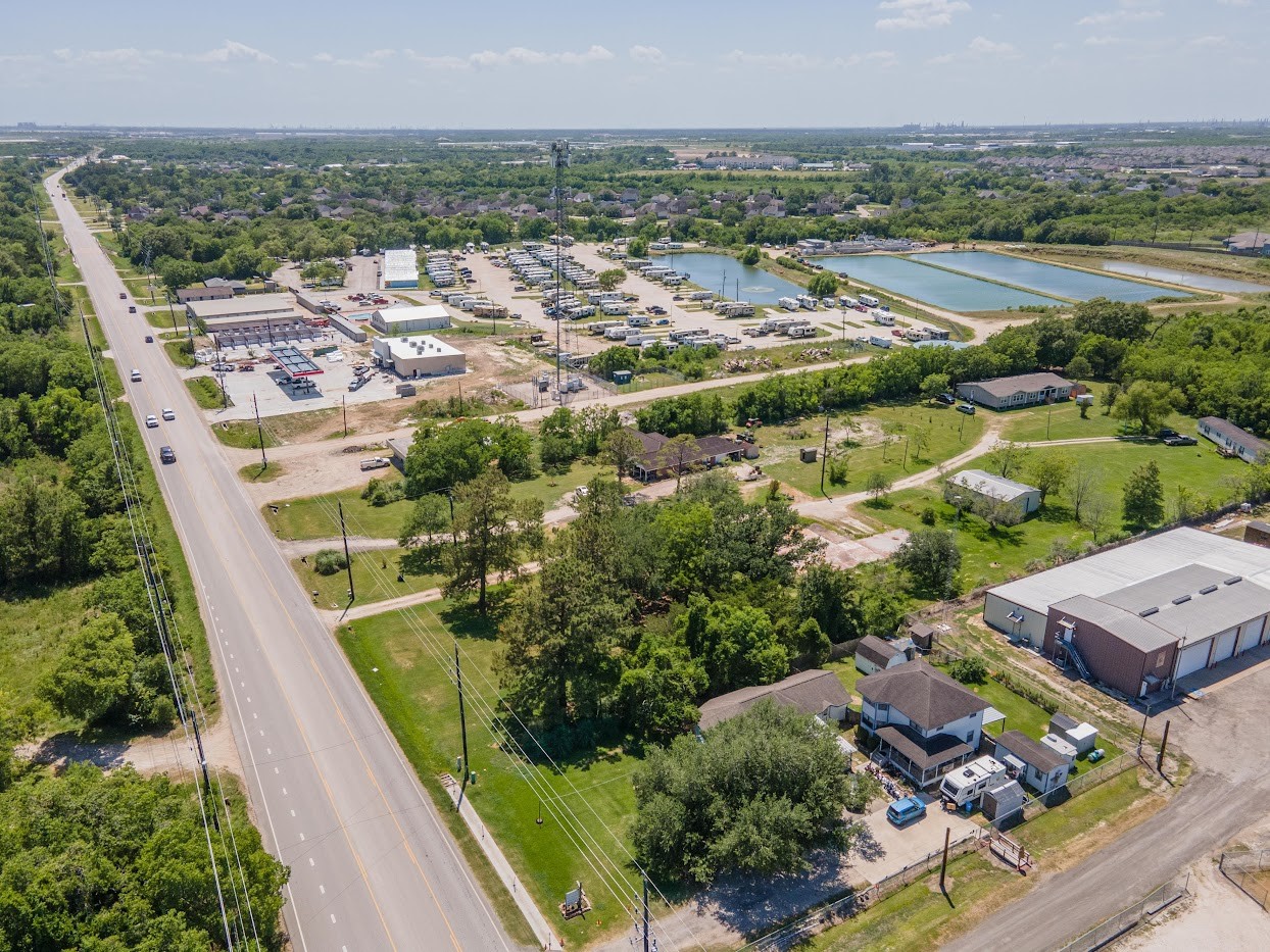 5707 South Farm-to-Market 565 Road Baytown, TX 77523 - Photo 6 of 18 an aerial view of residential houses with outdoor space