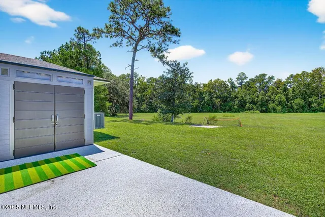 a view of a backyard with a garden