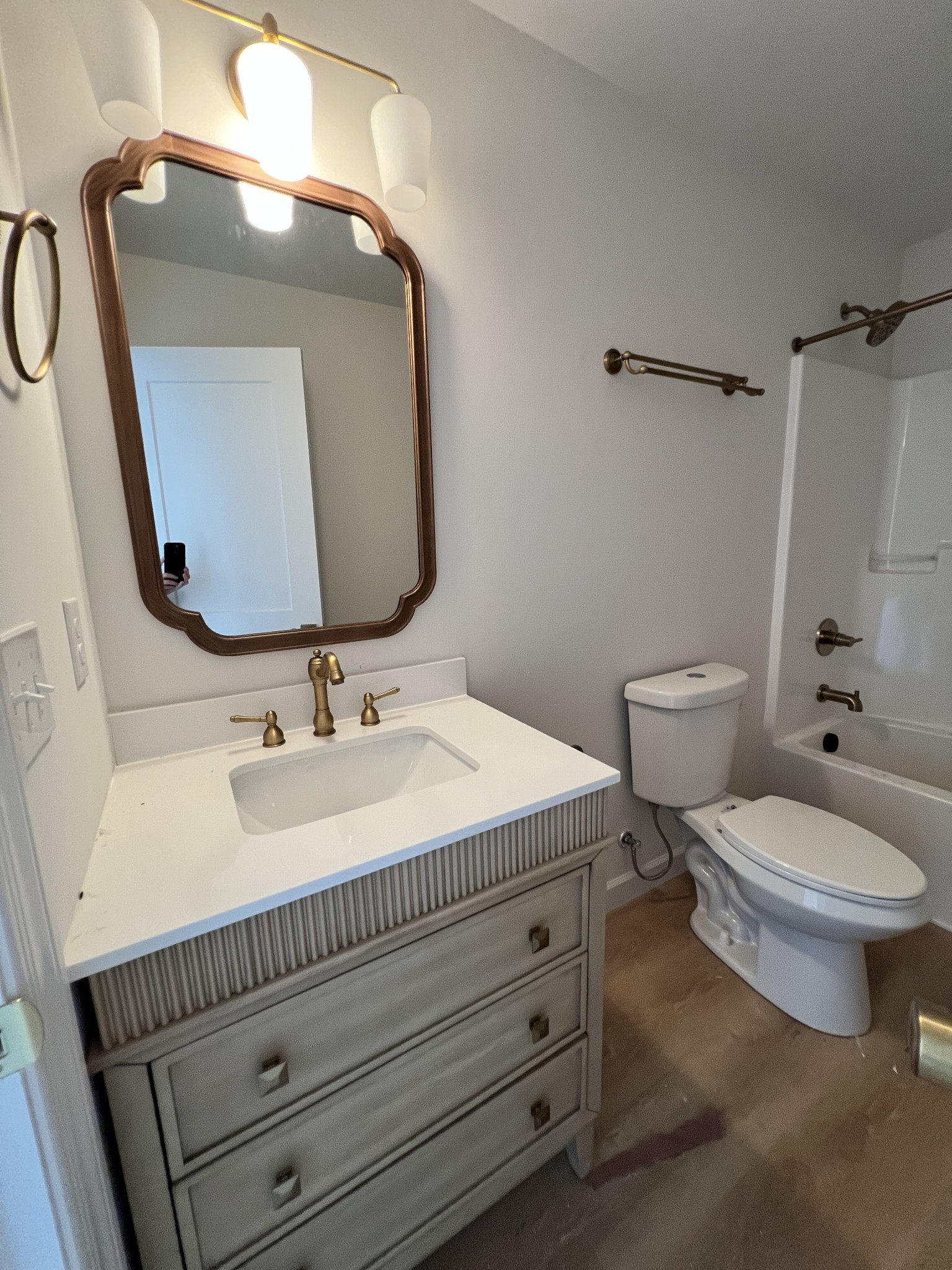 9710 Campbellsville Road Pulaski, TN 38478 - Photo 19 of 22 a bathroom with a toilet sink and mirror
