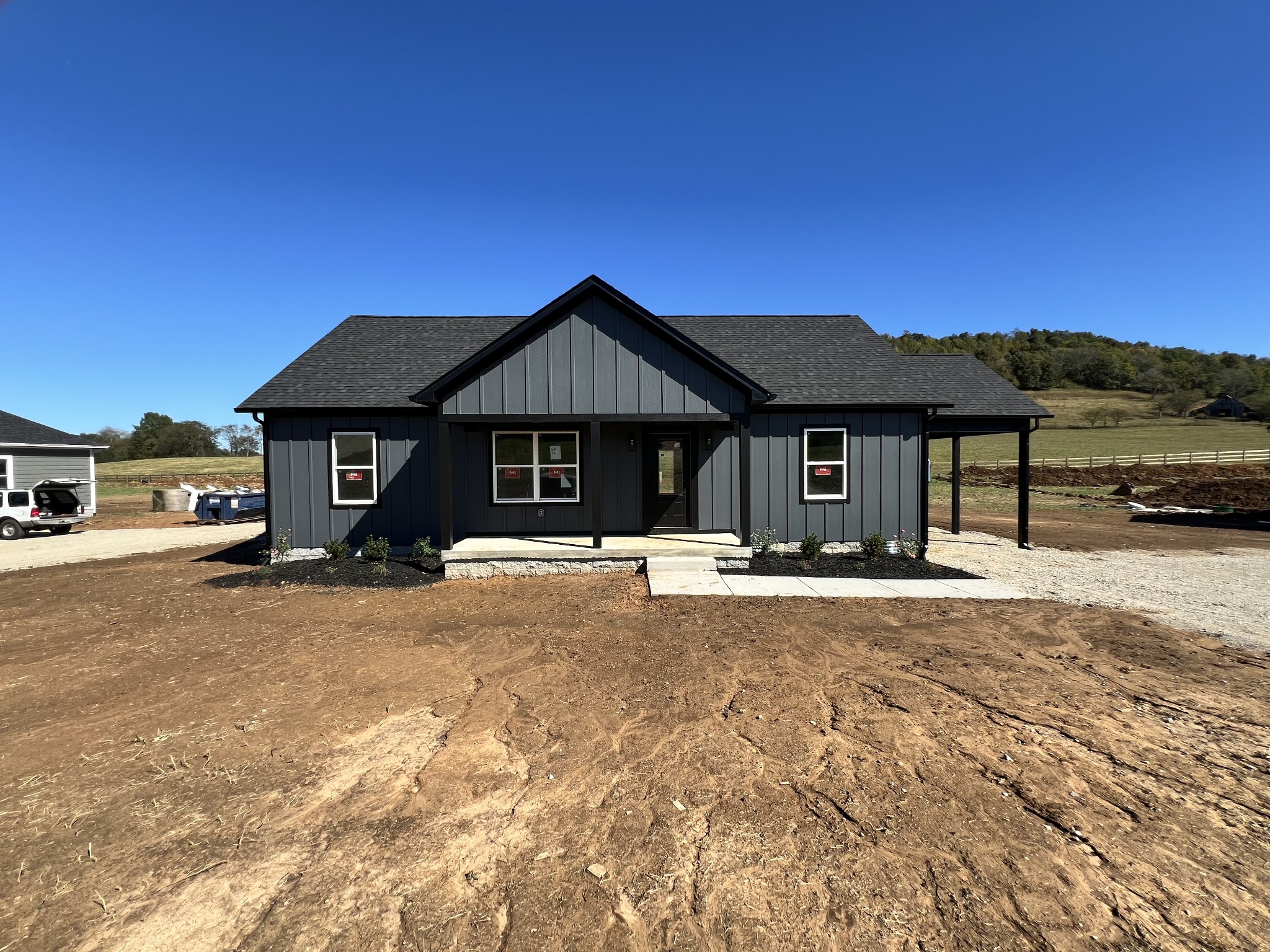 9710 Campbellsville Road Pulaski, TN 38478 - Photo 2 of 22 a front view of a house with a yard