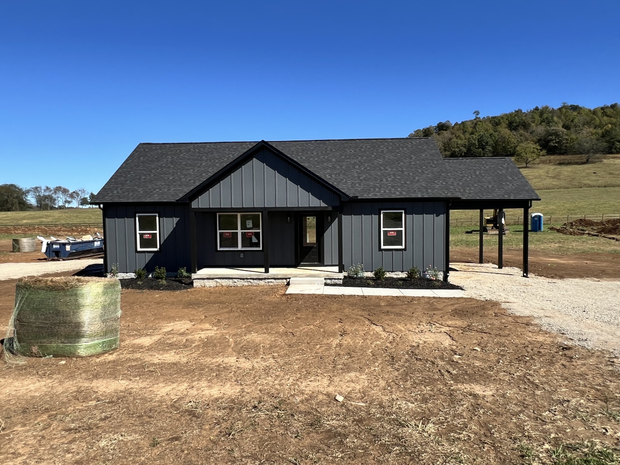 9710 Campbellsville Road Pulaski, TN 38478 - Photo 4 of 22 a front view of a house with a yard