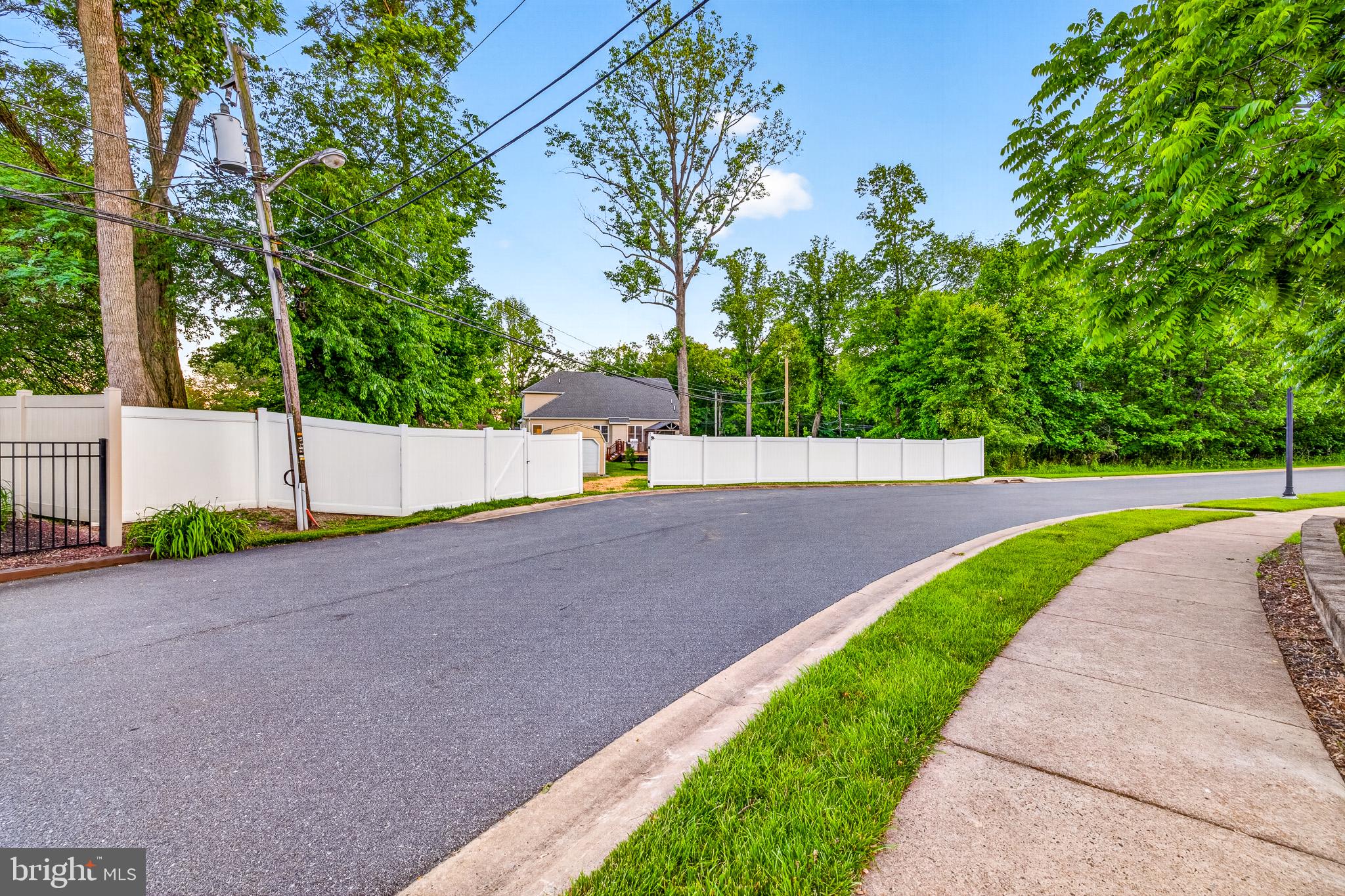 2623 Pike Creek Road Wilmington, DE 19808 - Photo 60 of 66 Serene corner lot with lush greenery.