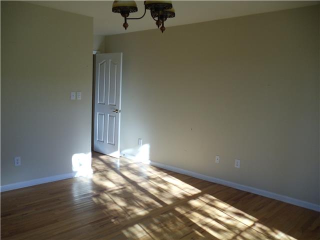 651 Shoal Creek Road Prospect, TN 38477 - Photo 8 of 20 a view of empty room with wooden floor