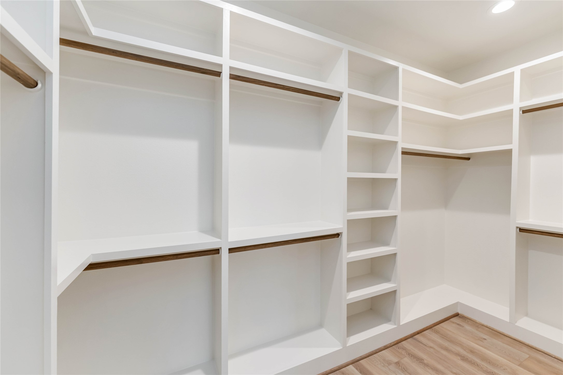 11108 Bauman Road Houston, TX 77076 - Photo 16 of 25 a view of an empty walk in closet