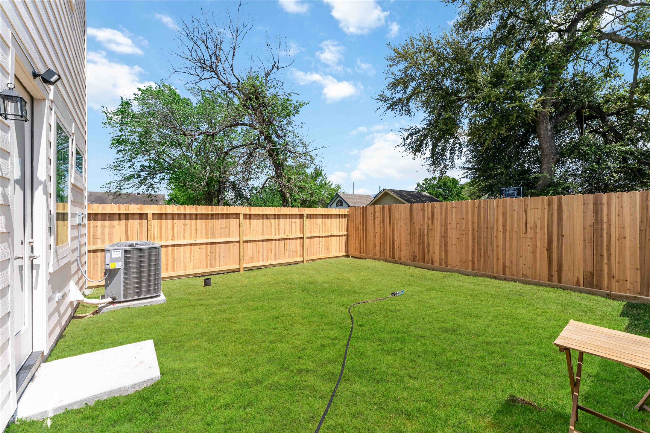 11108 Bauman Road Houston, TX 77076 - Photo 23 of 25 a view of a backyard with a garden