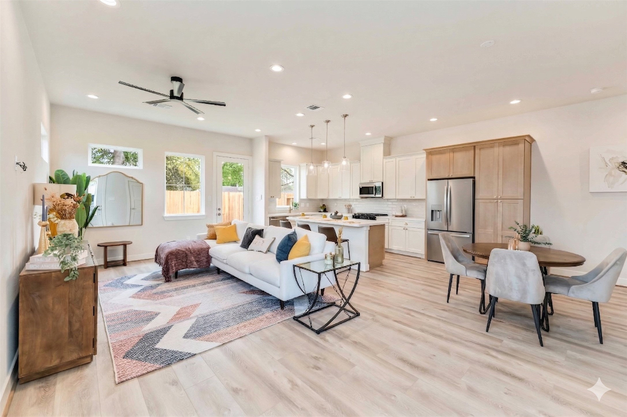 11108 Bauman Road Houston, TX 77076 - Photo 3 of 25 a living room with furniture and kitchen view