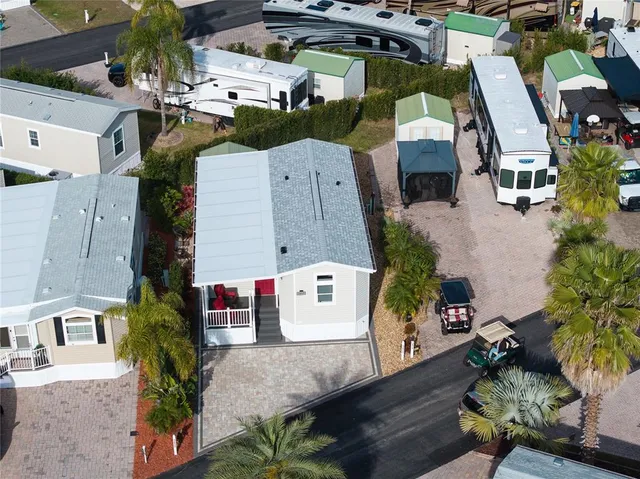 an aerial view of a house with a garden