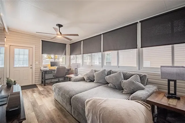 a bedroom with a bed and a lamp