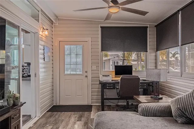a work room with furniture and a window
