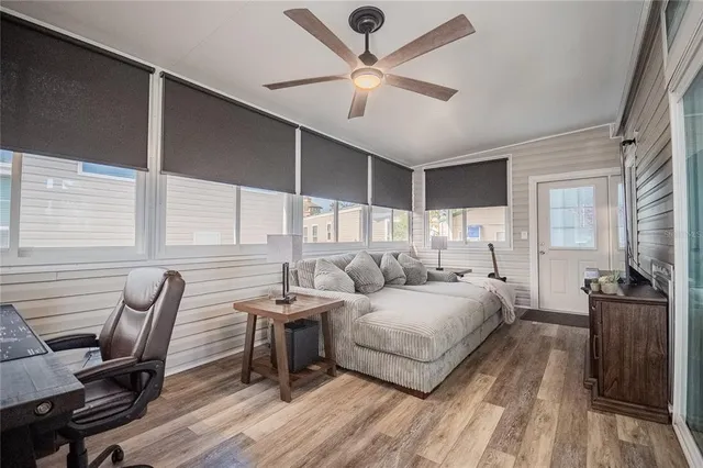 a bedroom with furniture and a window