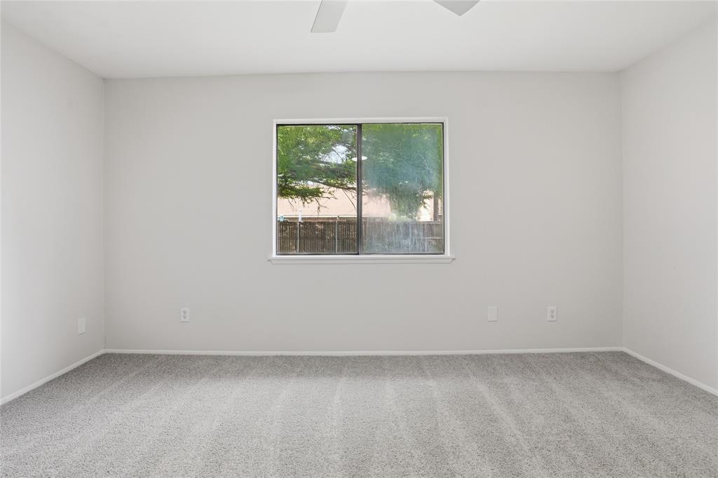 403 Redbud Drive Forney, TX 75126 - Photo 10 of 17 an empty room with a window