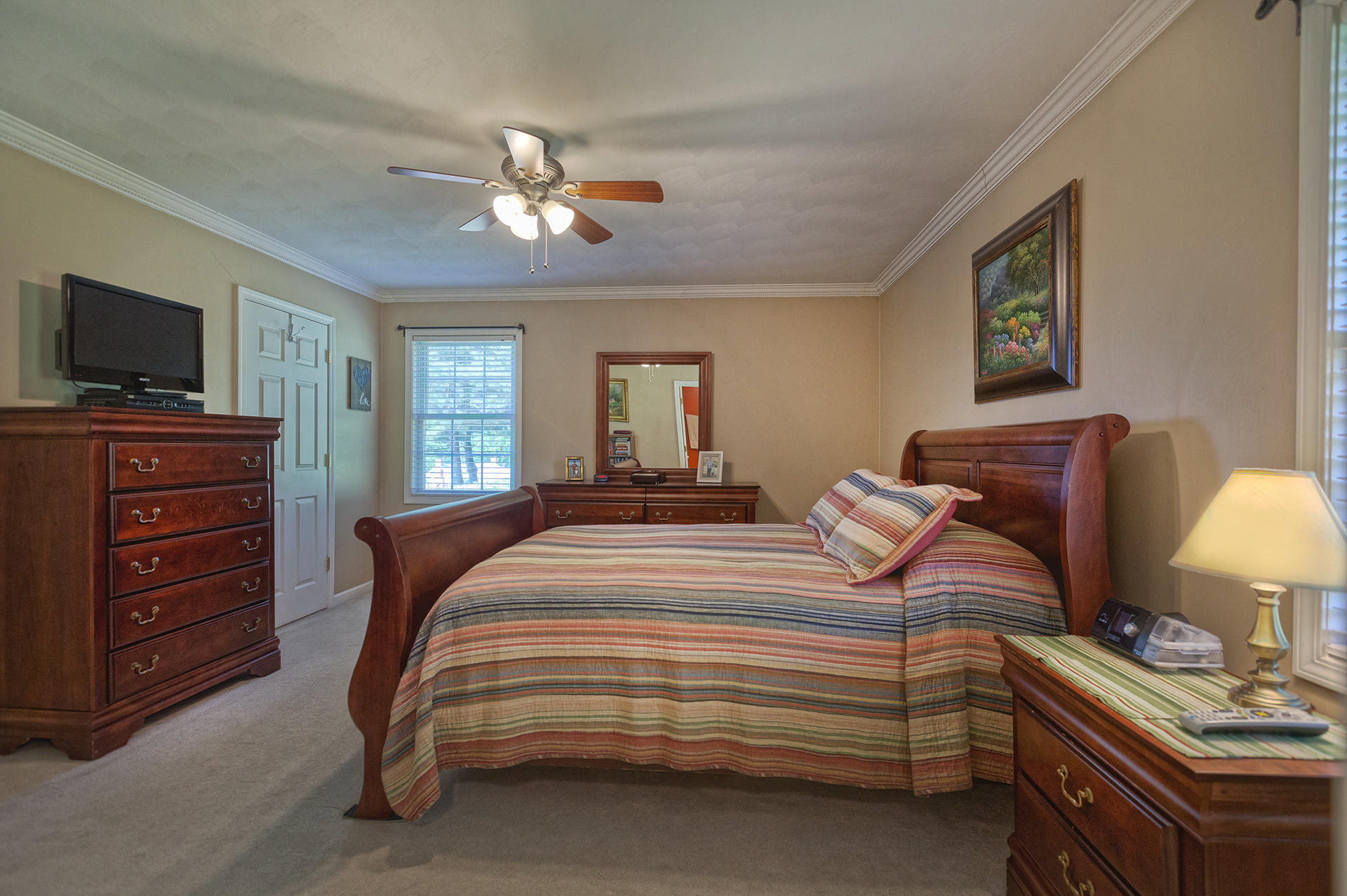 5533 Roanoke Road Troutville, VA 24175 - Photo 18 of 45 a bedroom with a bed and a flat screen tv