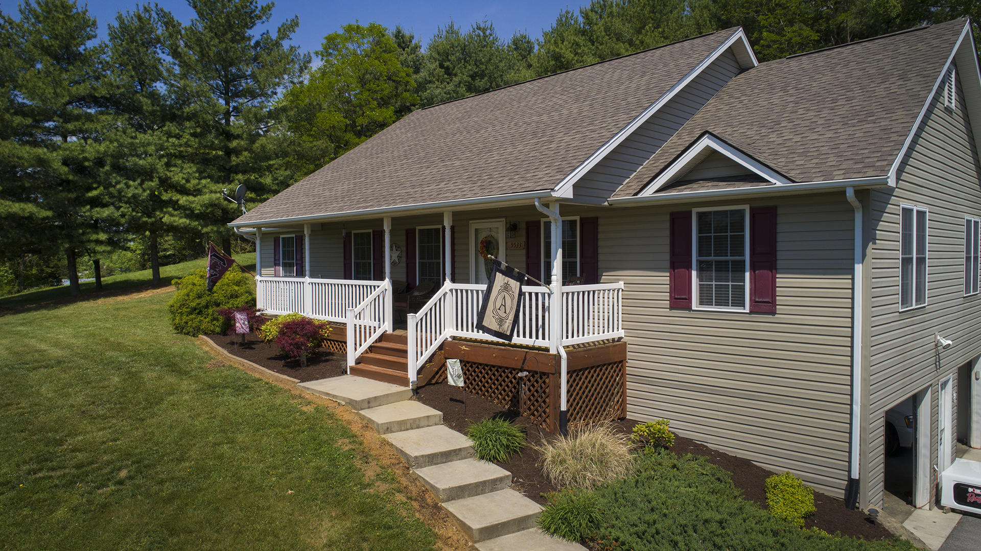 5533 Roanoke Road Troutville, VA 24175 - Photo 35 of 45 a view of a house with a backyard and a patio