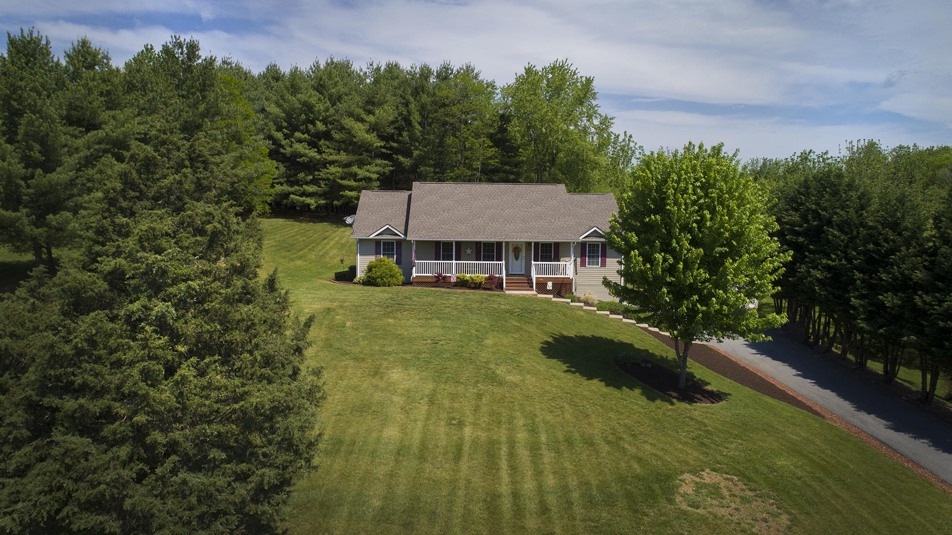 5533 Roanoke Road Troutville, VA 24175 - Photo 38 of 45 a aerial view of a house with yard and green space