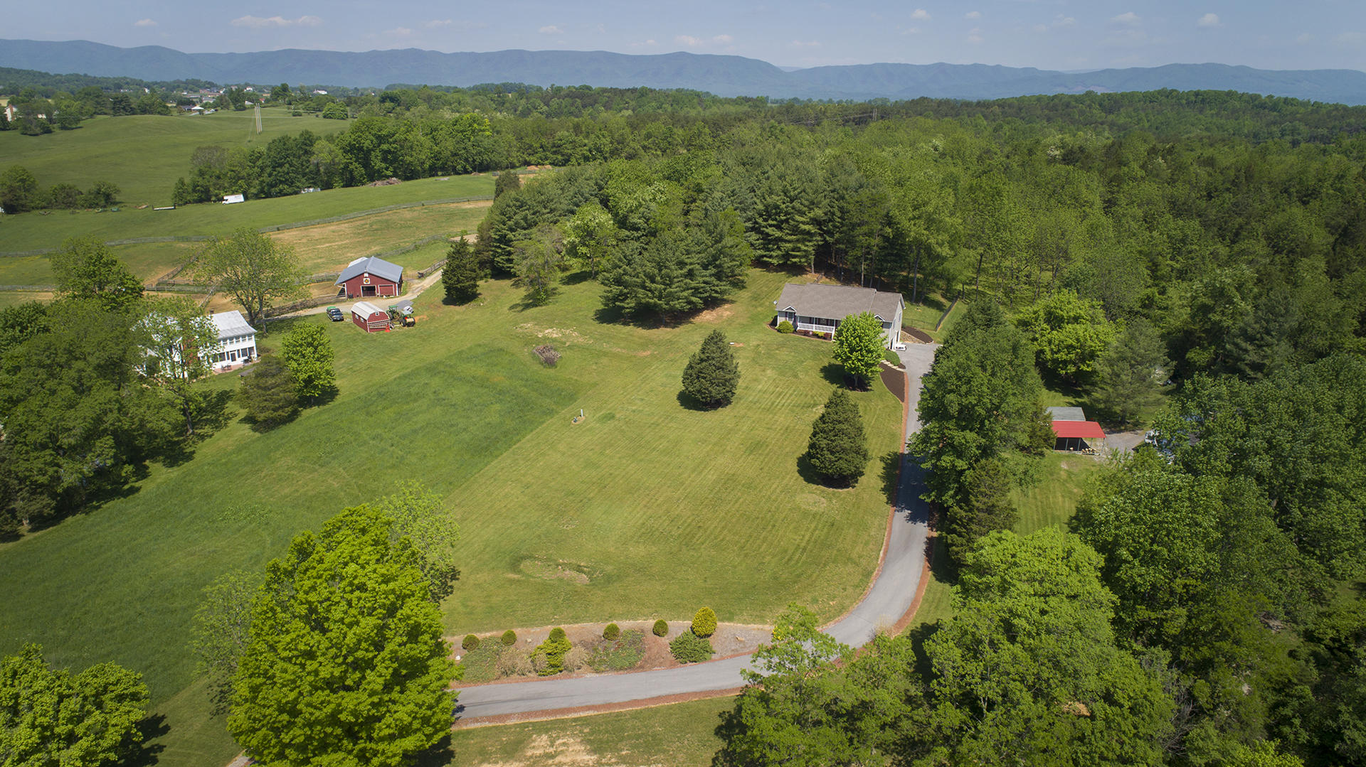 5533 Roanoke Road Troutville, VA 24175 - Photo 40 of 45 a view of a lake with a mountain in the back
