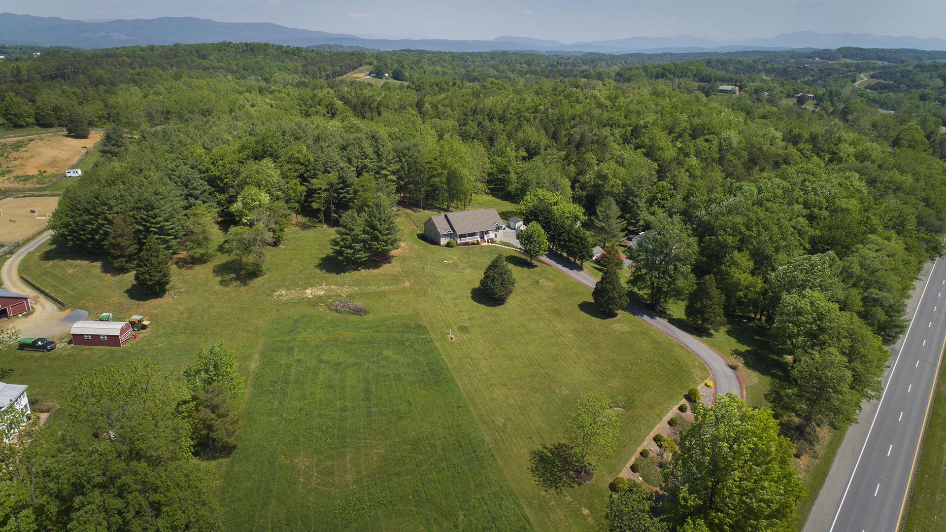 5533 Roanoke Road Troutville, VA 24175 - Photo 41 of 45 a view of a lake with a mountain in the background