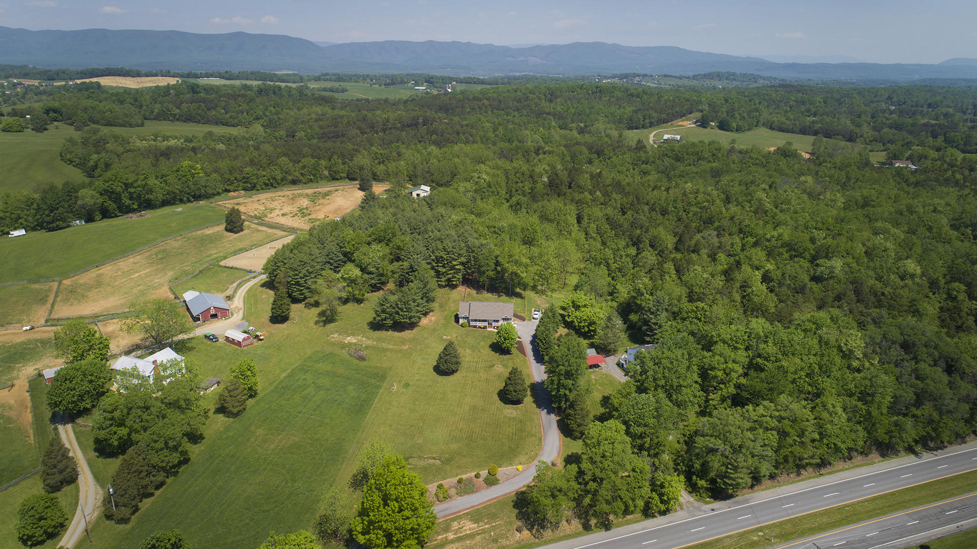 5533 Roanoke Road Troutville, VA 24175 - Photo 42 of 45 an aerial view of a residential houses with outdoor space and trees all around