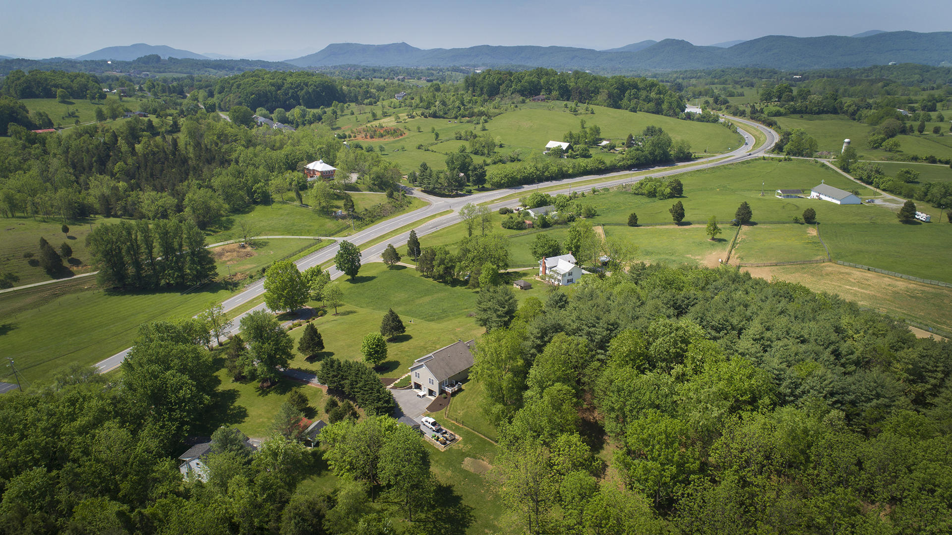5533 Roanoke Road Troutville, VA 24175 - Photo 44 of 45 a view of a lush green hillside and houses