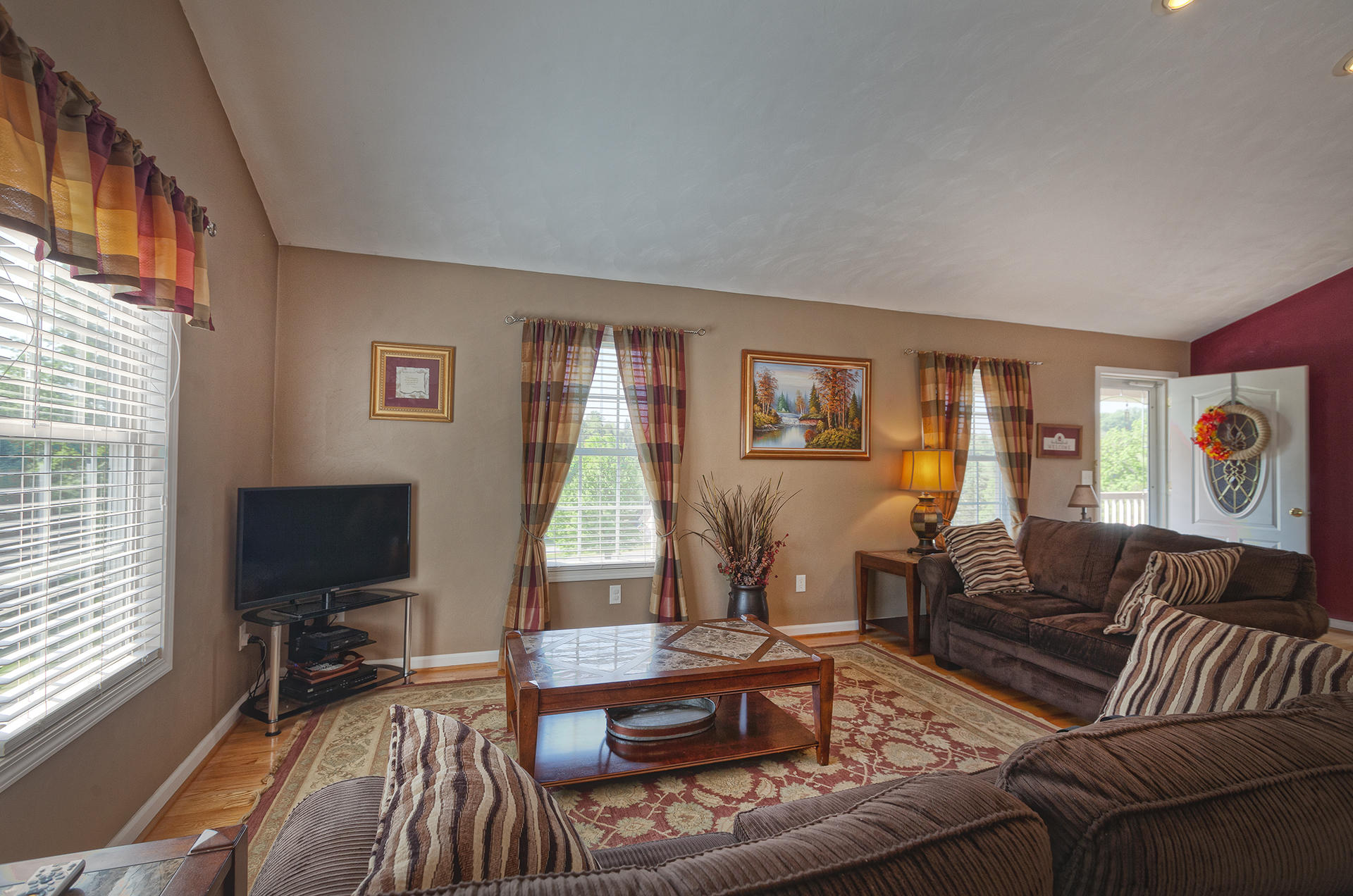 5533 Roanoke Road Troutville, VA 24175 - Photo 7 of 45 a living room with furniture and a flat screen tv