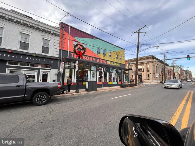 a car parked in front of a building