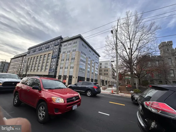 a cars parked in front of a building