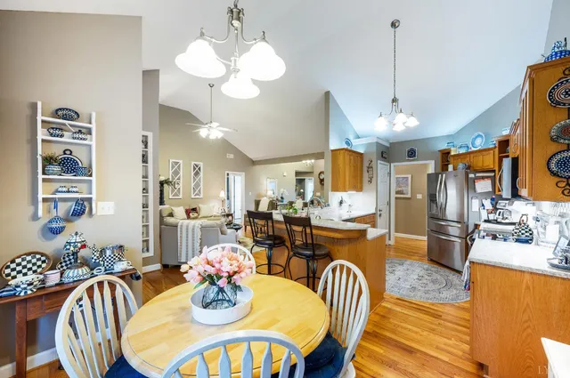 a kitchen with granite countertop a sink and a window